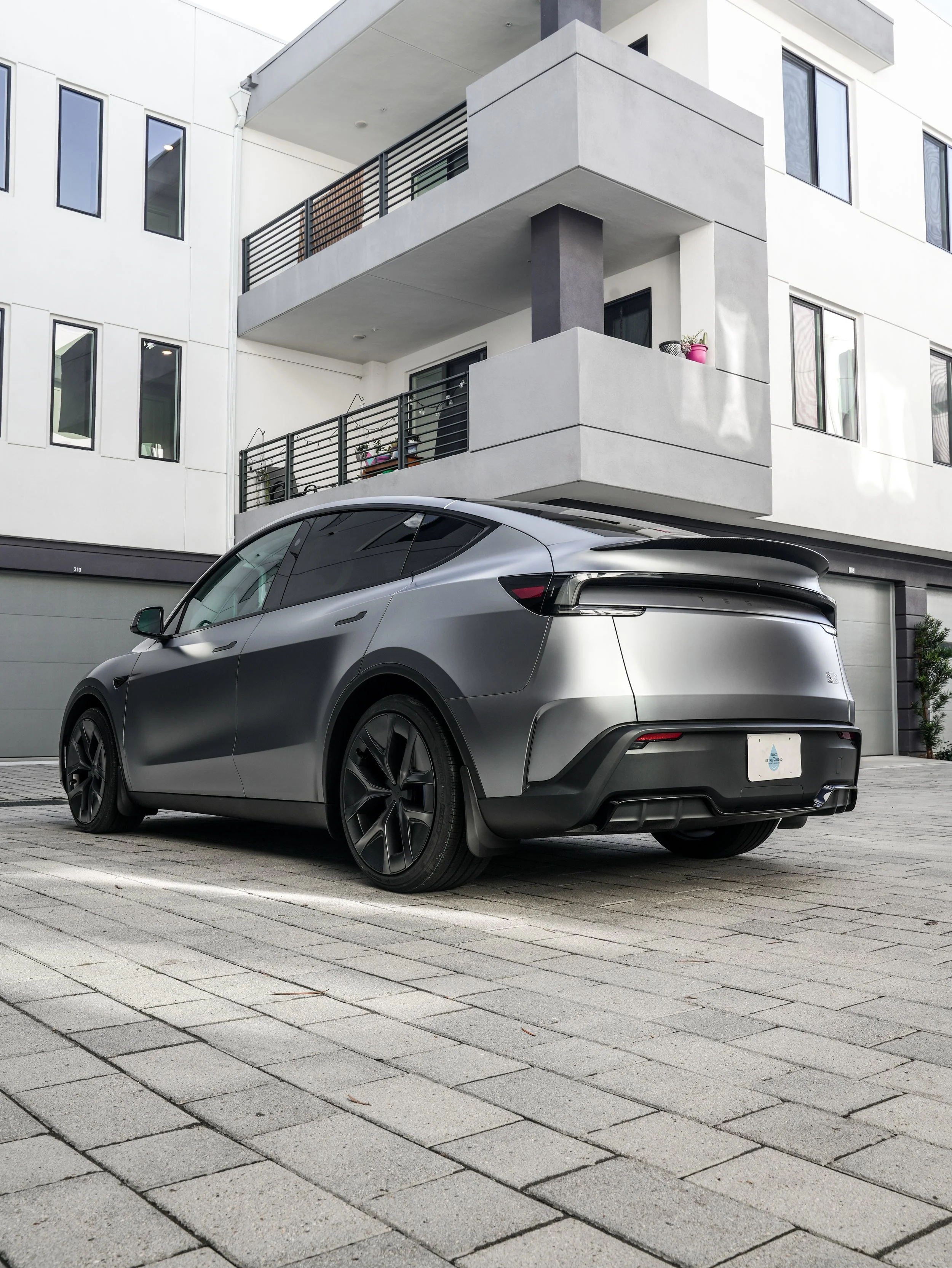 tesla-model-y-performance-matte-ppf-10-rear-three-quarter-wide-view.jpg
