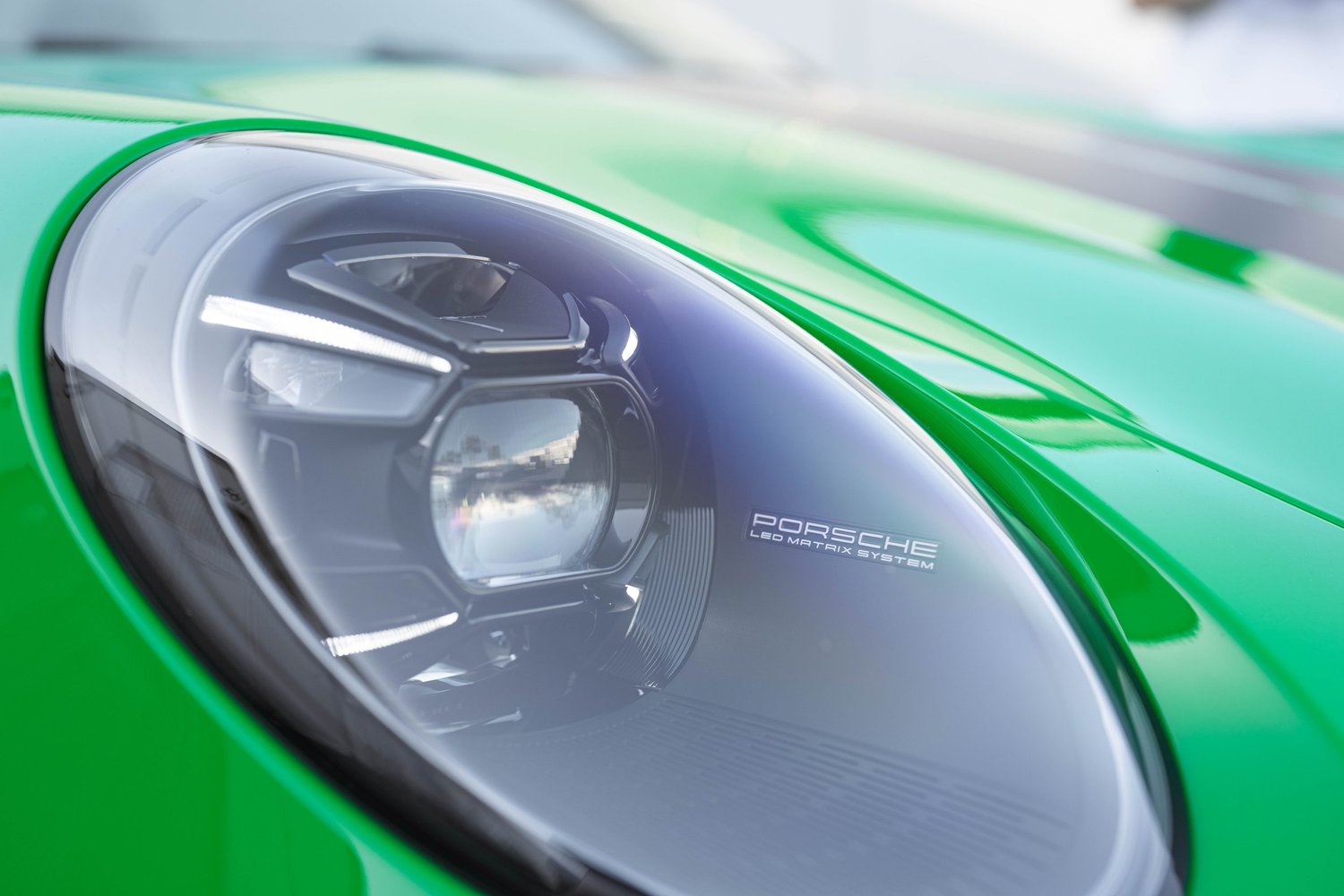 Signal Green Porsche 911 Turbo S after Paint Protection Film (PPF), Window Tint and Ceramic Coating, front-fender and wheel view