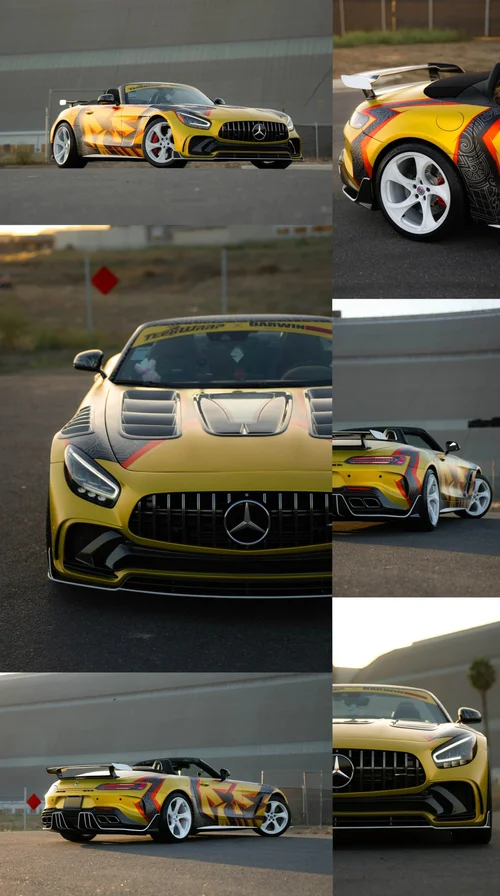 Yellow Mercedes-Benz performance vehicle with black and red accents photographed at a racetrack at sunset