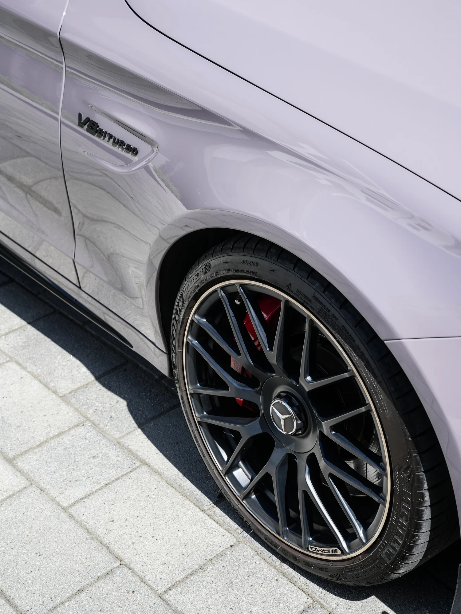 Mercedes-AMG C 63 S Inozetek Pigeon Grey after Vinyl Wrap, front-fender and wheel view
