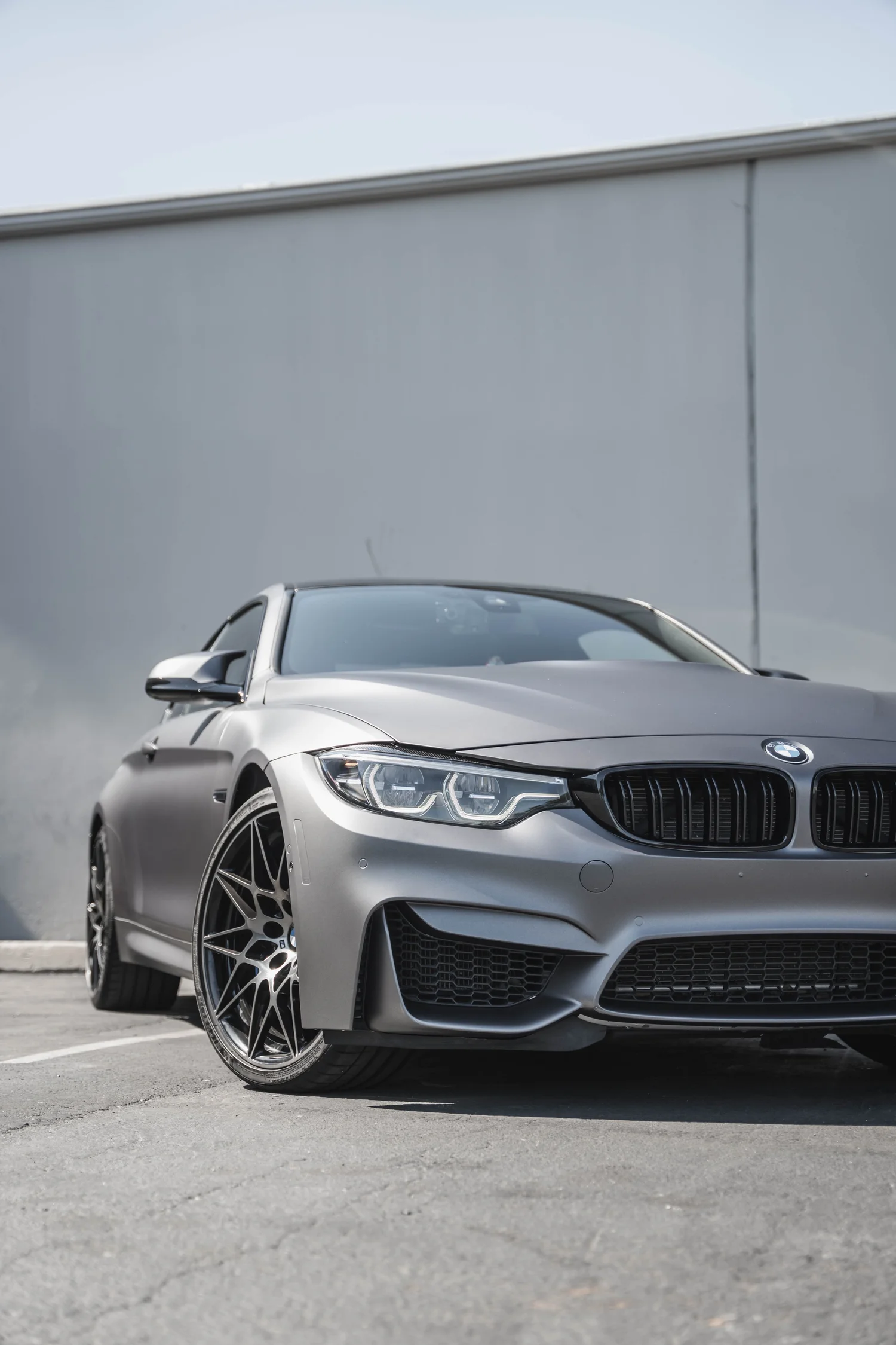 BMW M4 Matte Grey after Vinyl Wrap, front-right three-quarter view