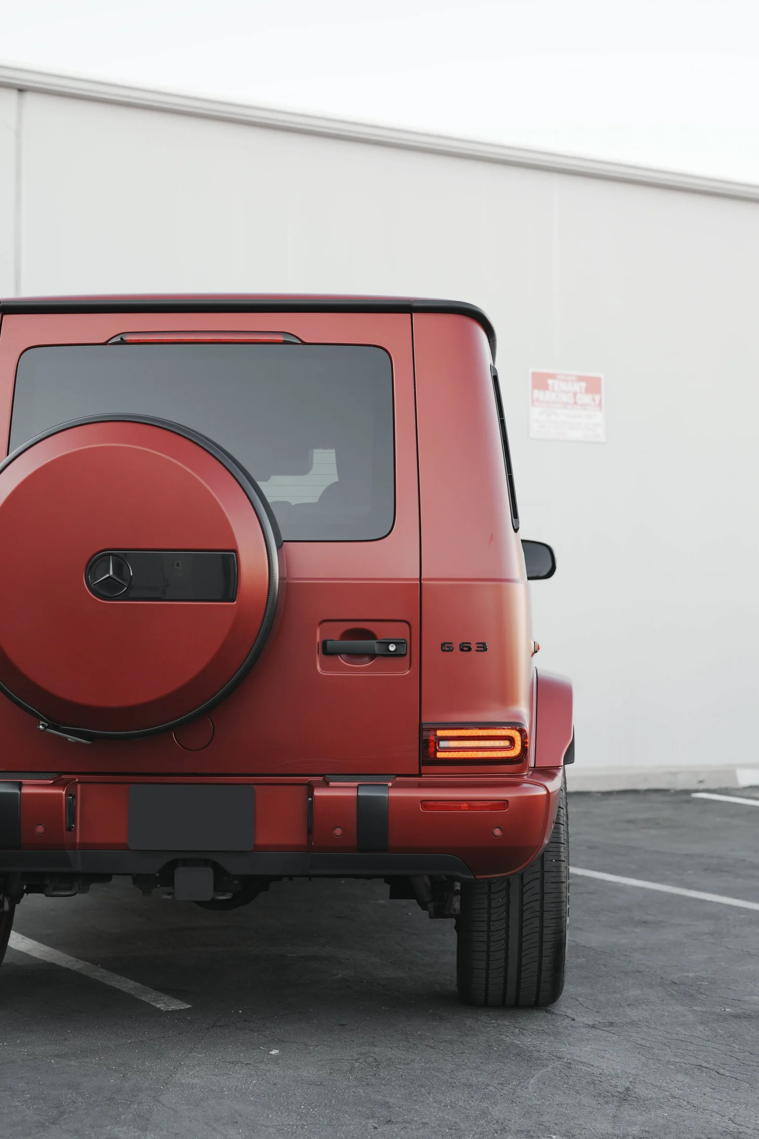 Red Mercedes-AMG G 63 after Matte PPF, Window Tint and Ceramic Coating, rear body and taillight view