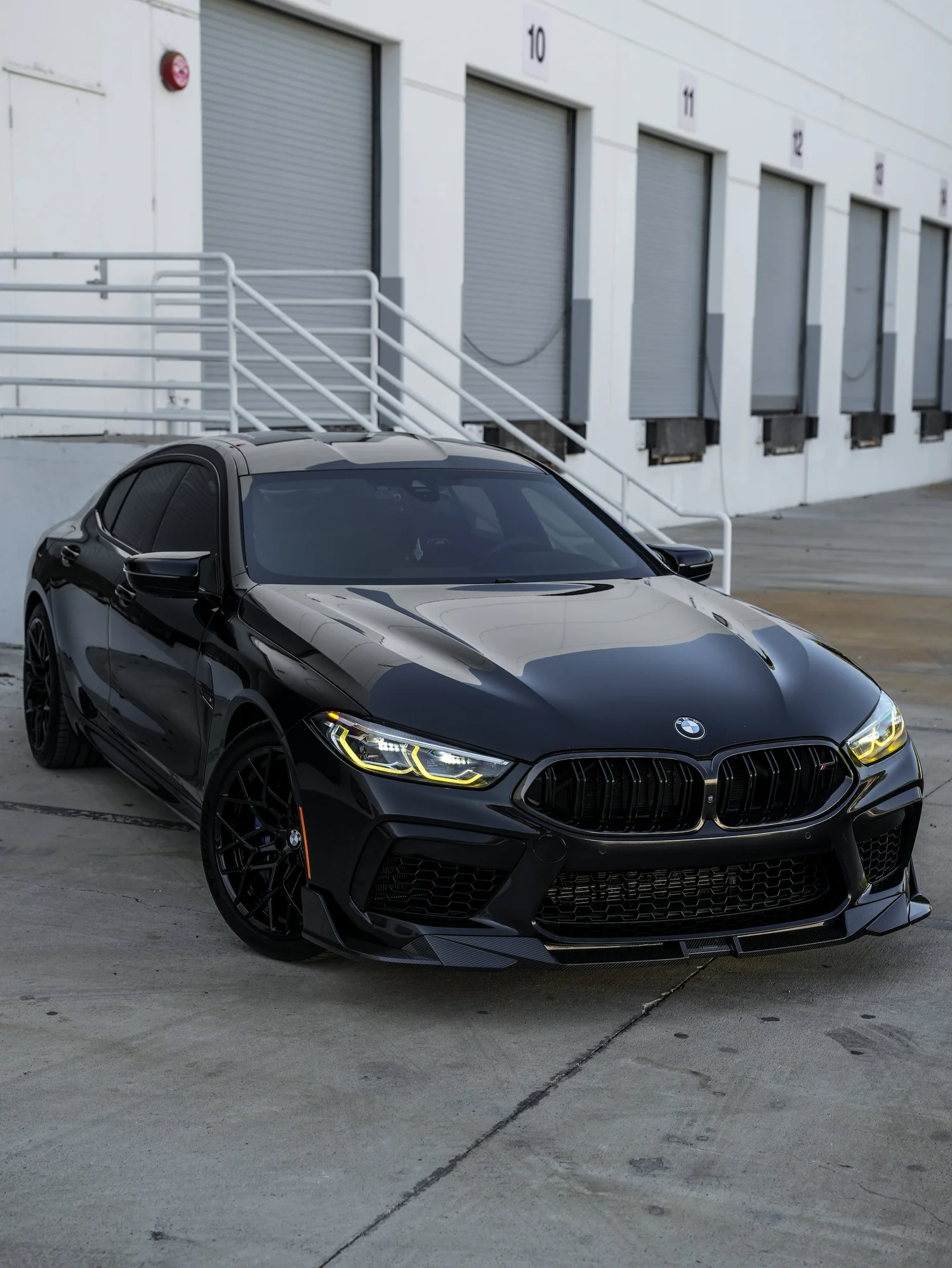 BMW M8 Paint Correction after Ceramic Coating, front-left three-quarter view