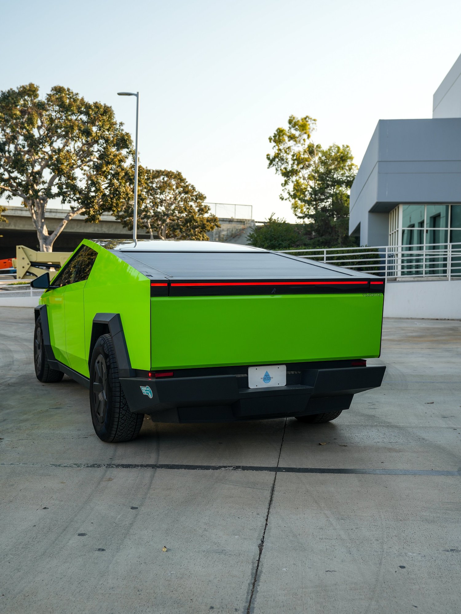 Tesla Cybertruck 3M Gloss Green after Vinyl Wrap, rear-right three-quarter view