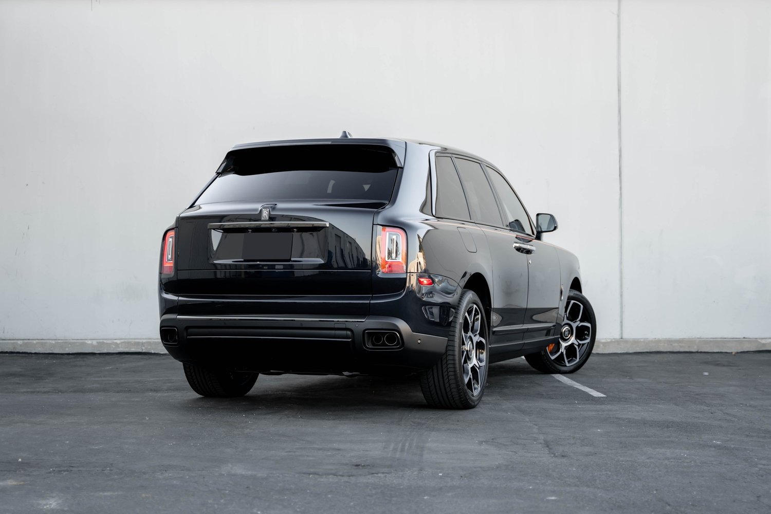 Black Rolls-Royce Cullinan Black Badge after Paint Protection Film (PPF), Window Tint and Ceramic Coating, rear-right three-quarter view