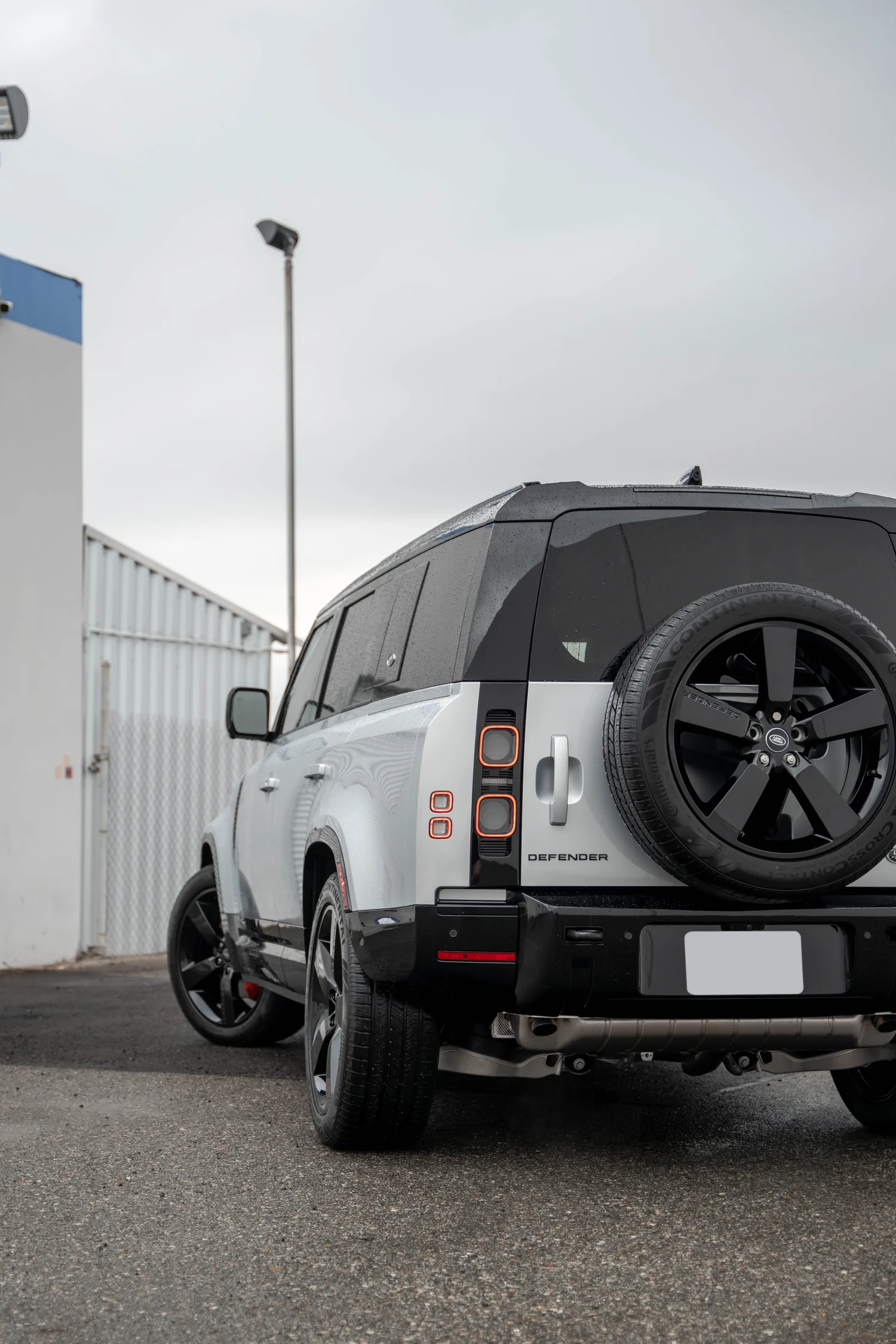 Land Rover Defender after Paint Protection Film (PPF), Window Tint and Ceramic Coating, tight rear three-quarter view