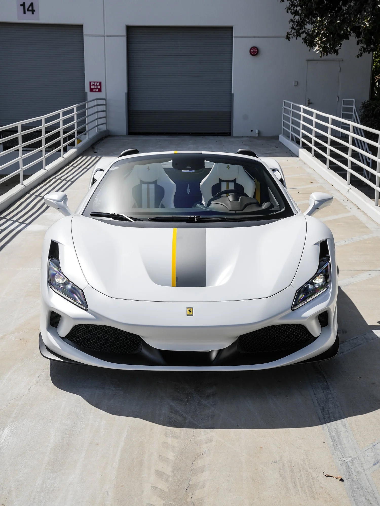 Ferrari F8 Spider after Matte PPF and Window Tint, direct front view