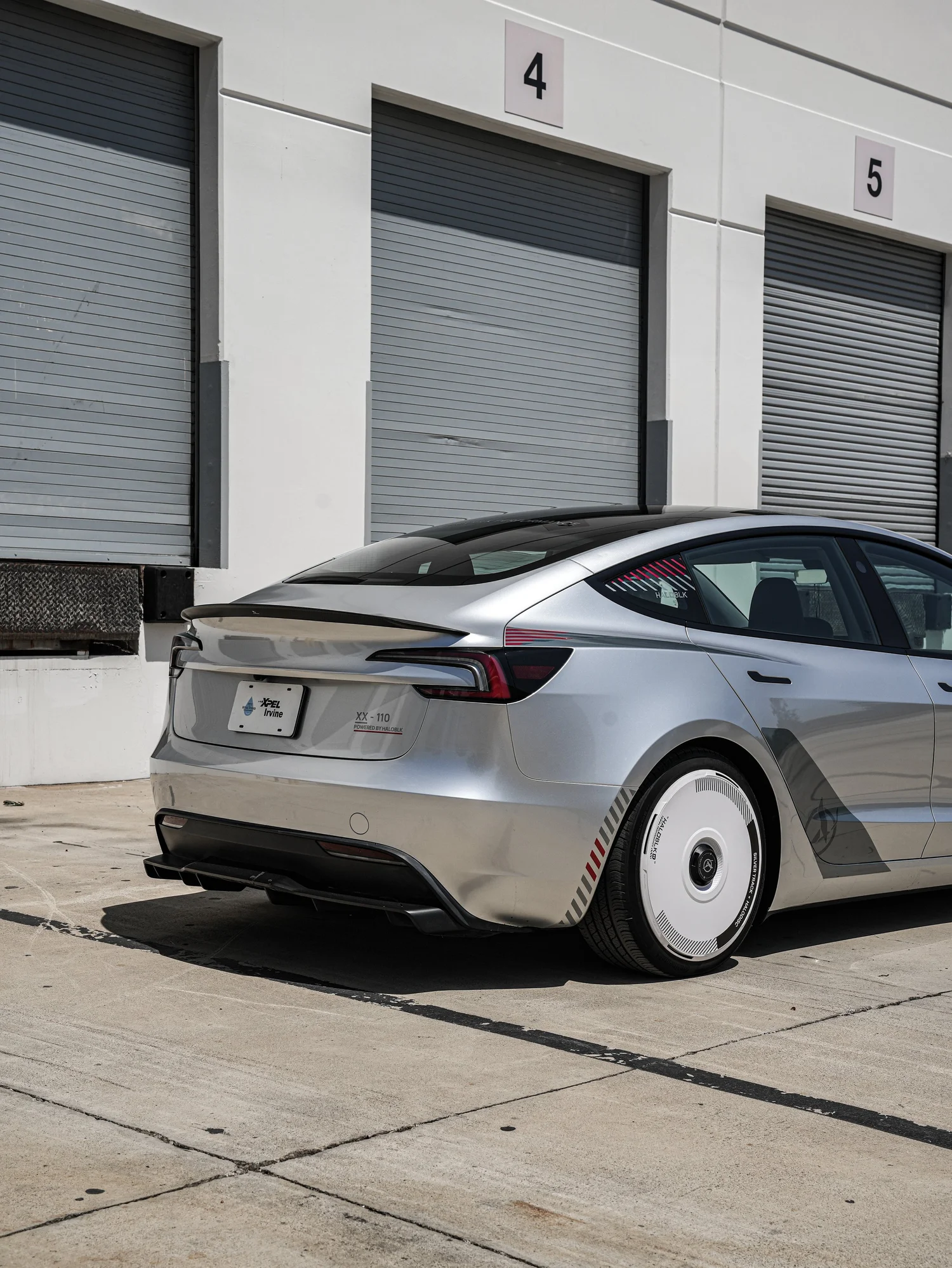 Tesla Model 3 Halo Edition Custom Wrap after Vinyl Wrap, rear-right three-quarter view