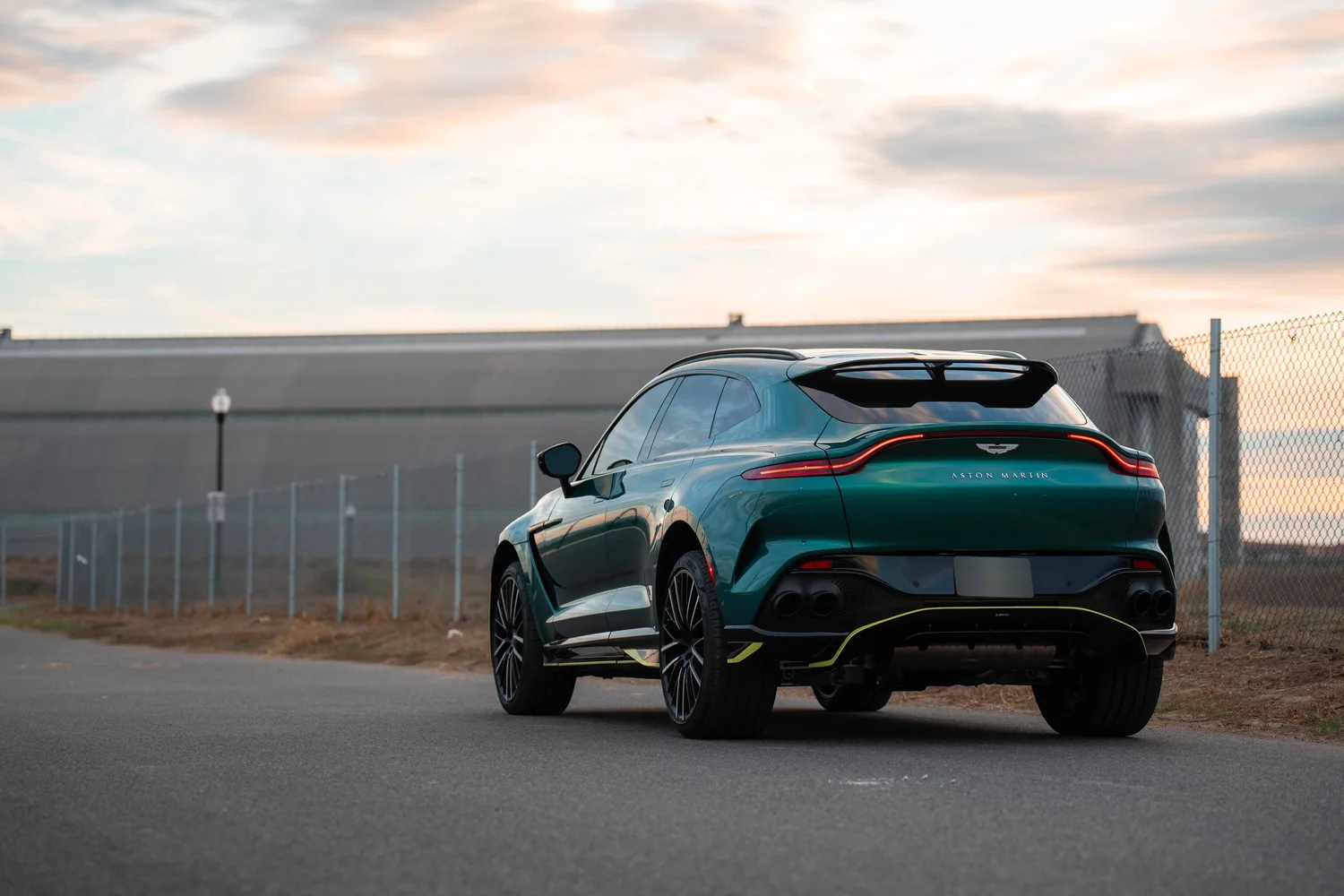 British Green Aston Martin DBX 707 after Paint Protection Film (PPF), Window Tint and Ceramic Coating, rear-left three-quarter view
