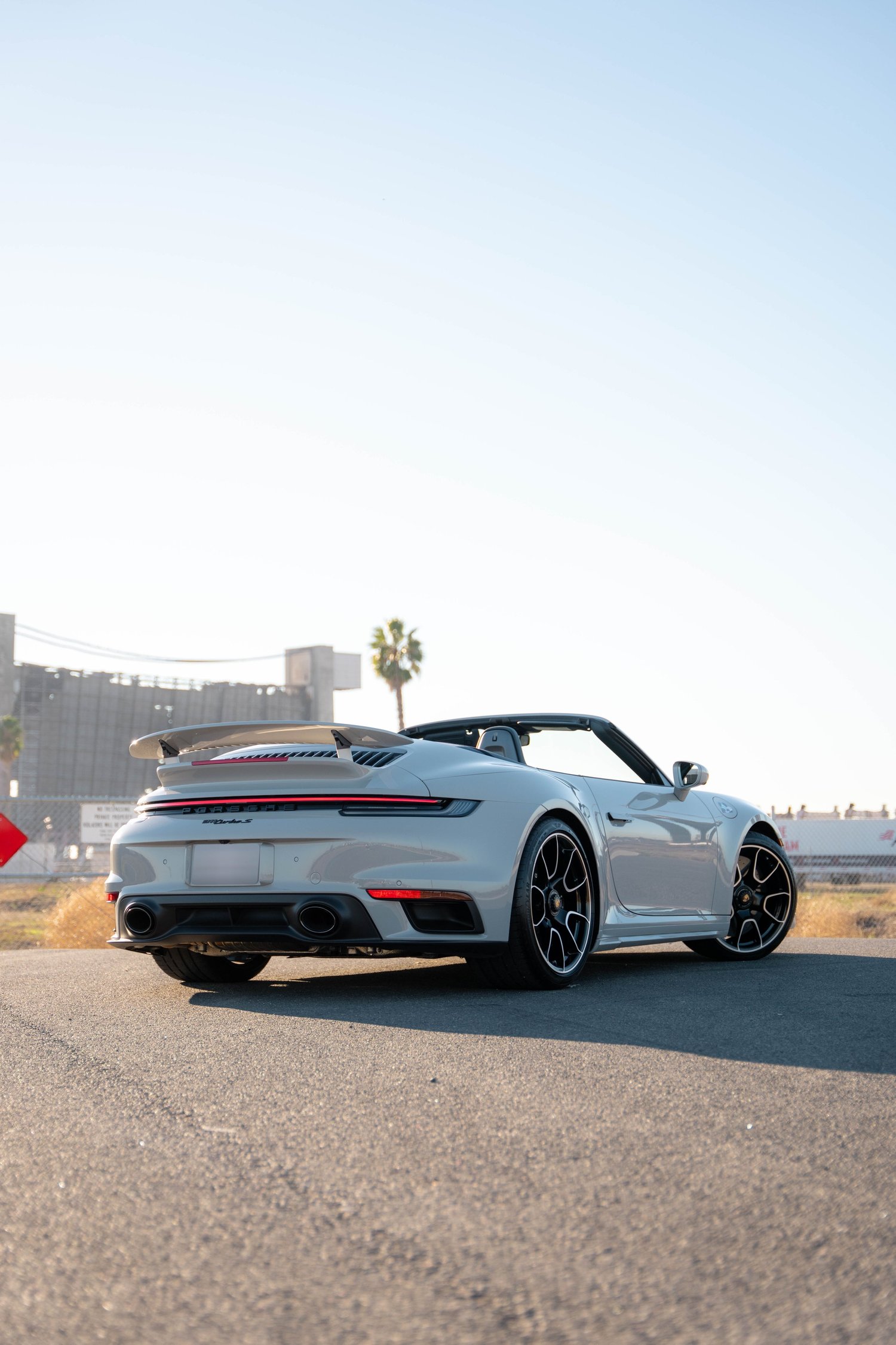 Chalk Porsche 911 Turbo S after Paint Protection Film (PPF), Window Tint and Ceramic Coating, rear-left three-quarter view
