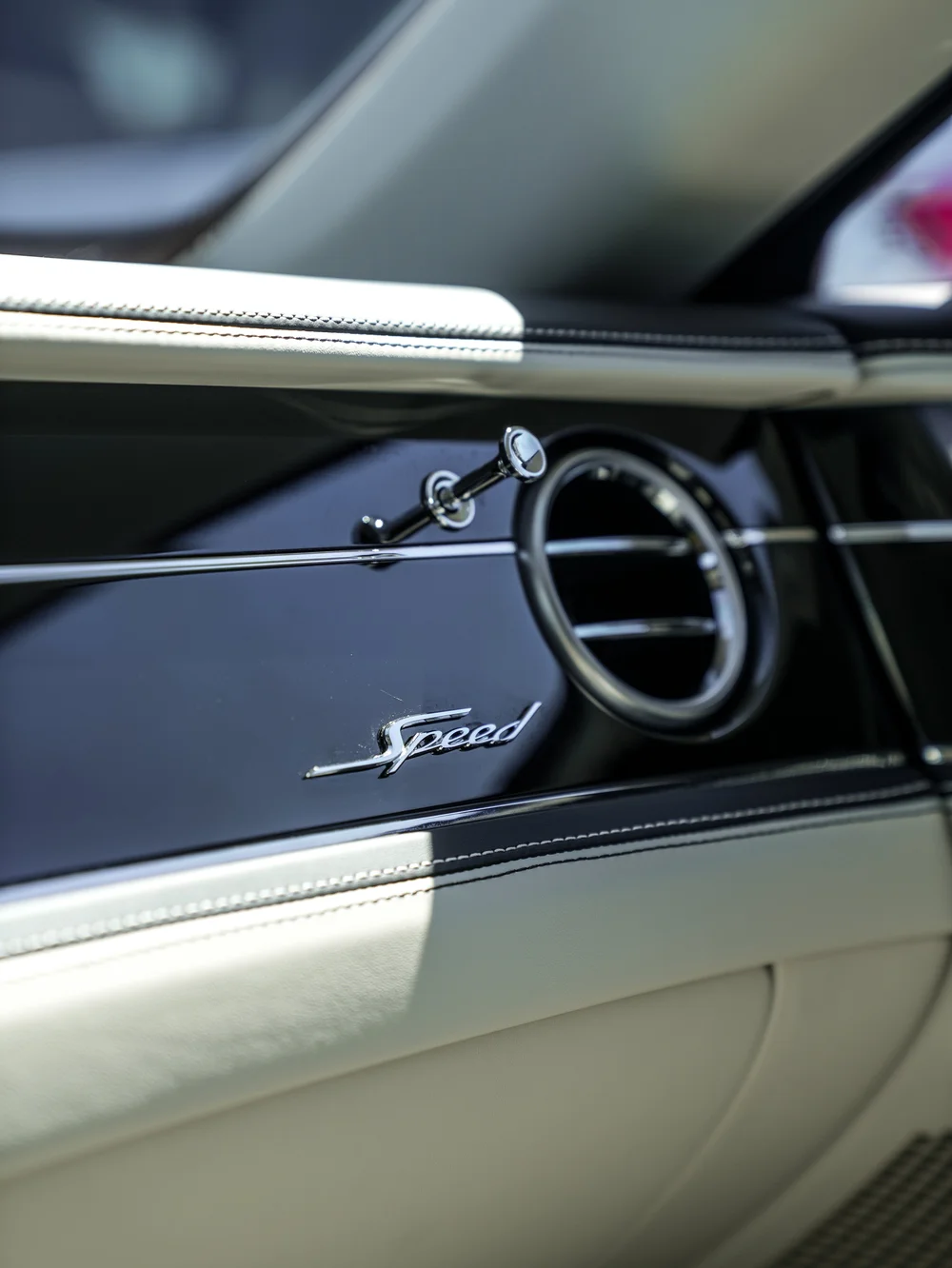 Bentley Flying Spur Speed passenger dashboard trim with a Speed badge and circular air vent