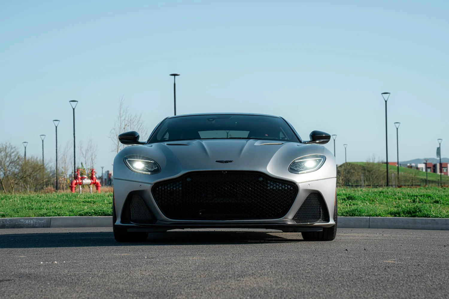 Front view of an Aston Martin DBS with matte paint protection film at Toyz Detail Studio