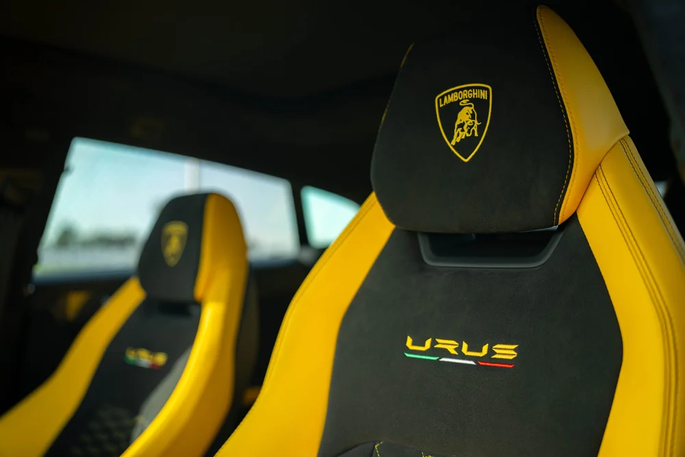 Lamborghini Urus with Chalk vinyl wrap, black and yellow front seats with Urus and Lamborghini embroidery