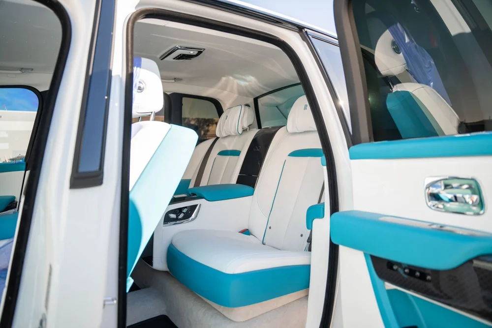 White and turquoise luxury vehicle interior suitable for leather, vinyl and fabric protection.