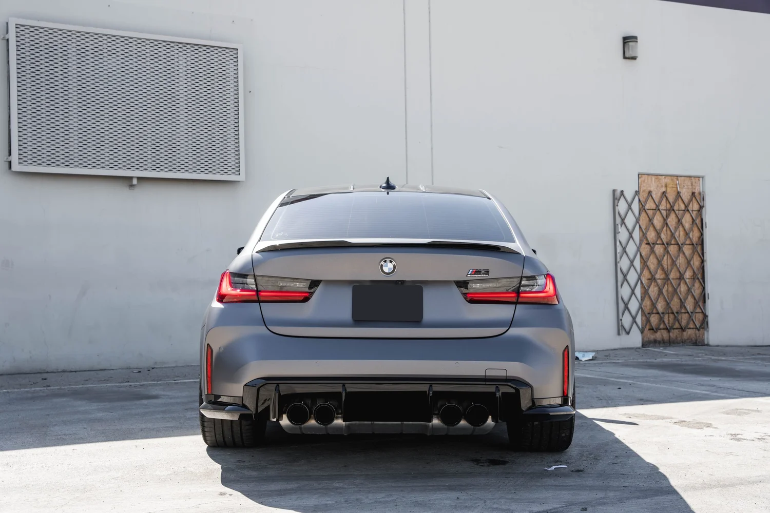 BMW M3 silver vinyl wrap, direct rear view