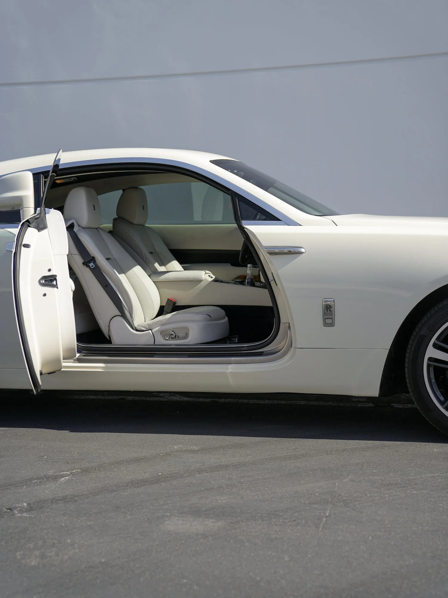 Rolls-Royce Wraith Inozetek Boneyard White after Vinyl Wrap, full vehicle with open doors