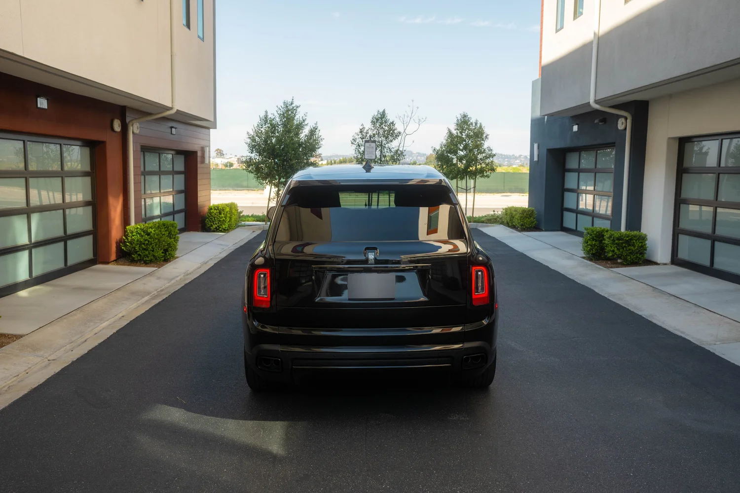 Black Rolls-Royce Cullinan Black Badge with Two-Tone Wheels after Paint Protection Film (PPF), Window Tint and Ceramic Coating, direct rear view