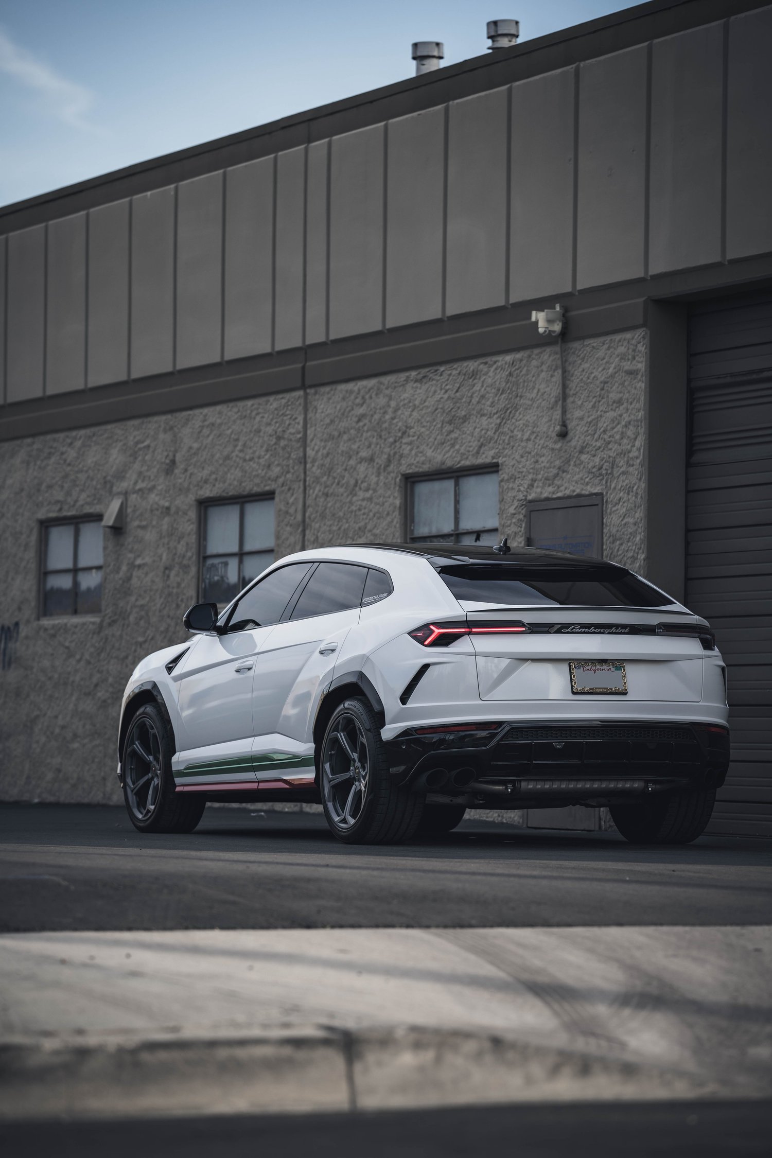 Lamborghini Urus Custom Project after Vinyl Wrap, rear-left three-quarter view