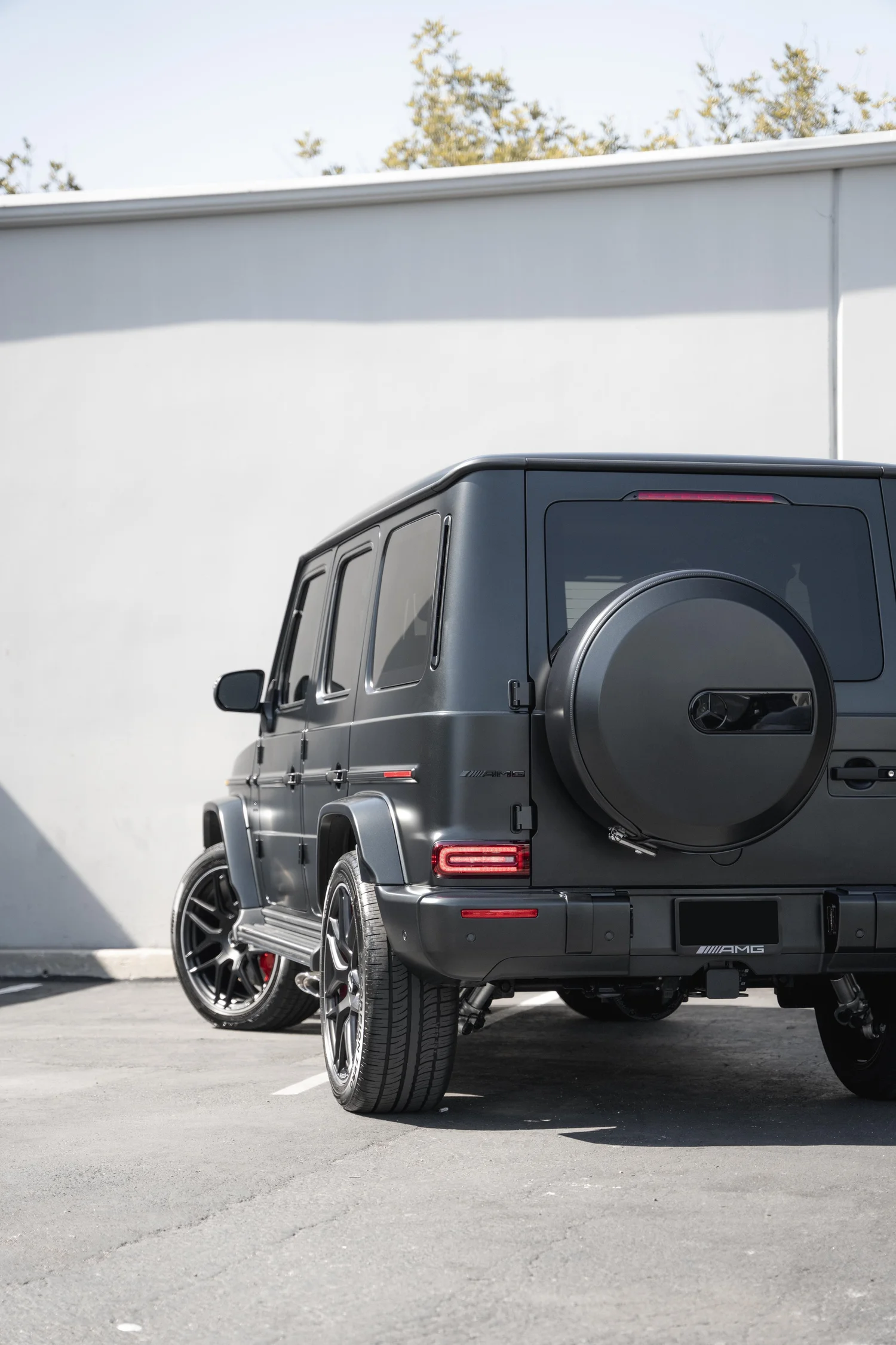Charcoal Grey Mercedes-AMG G 63 after Matte PPF, Window Tint and Ceramic Coating, rear-quarter and wheel view