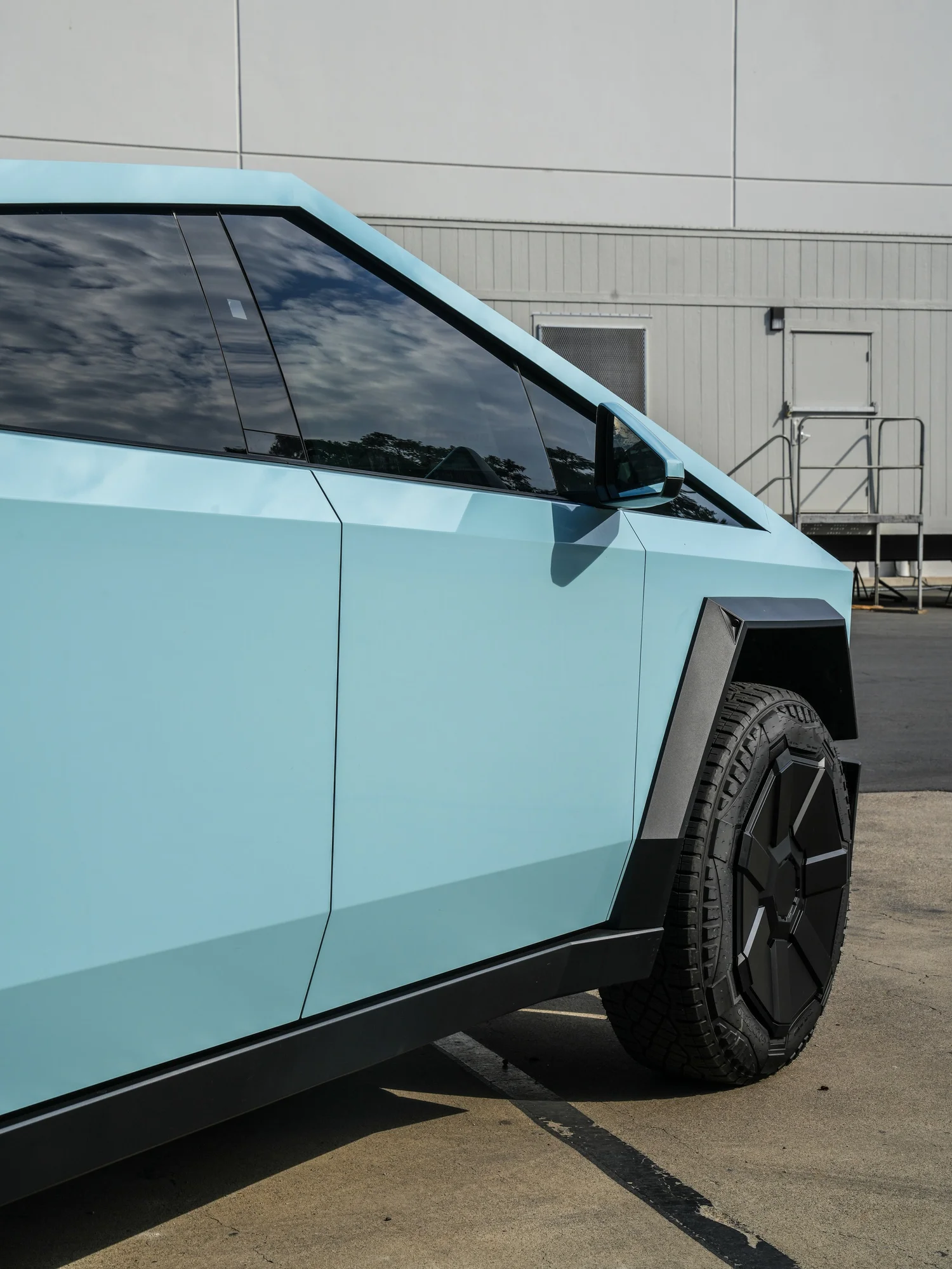 Tesla Cybertruck Permafrost Blue PPF after Paint Protection Film (PPF), side body-panel and door detail