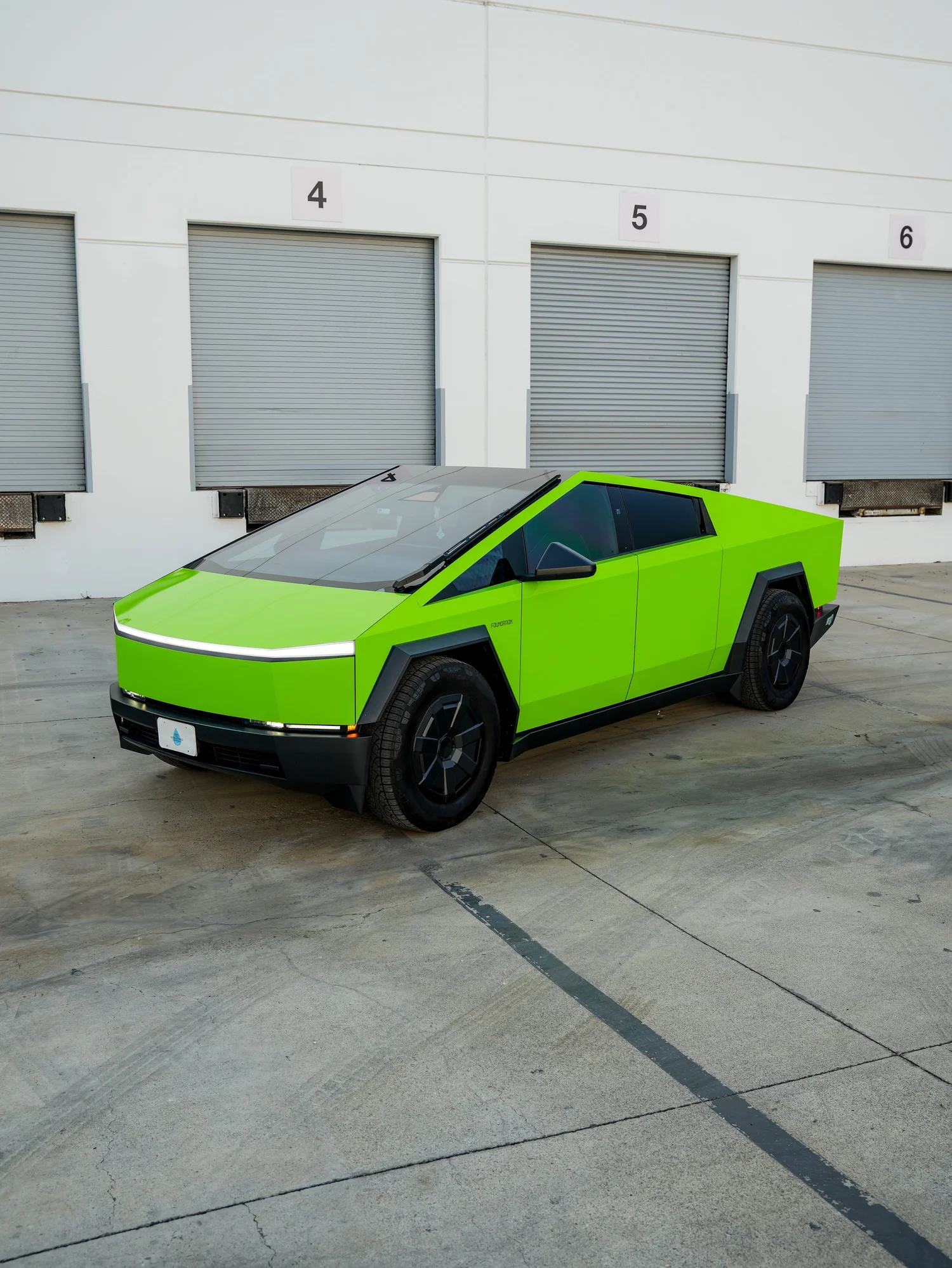 Tesla Cybertruck 3M Gloss Green after Vinyl Wrap, front-right three-quarter view