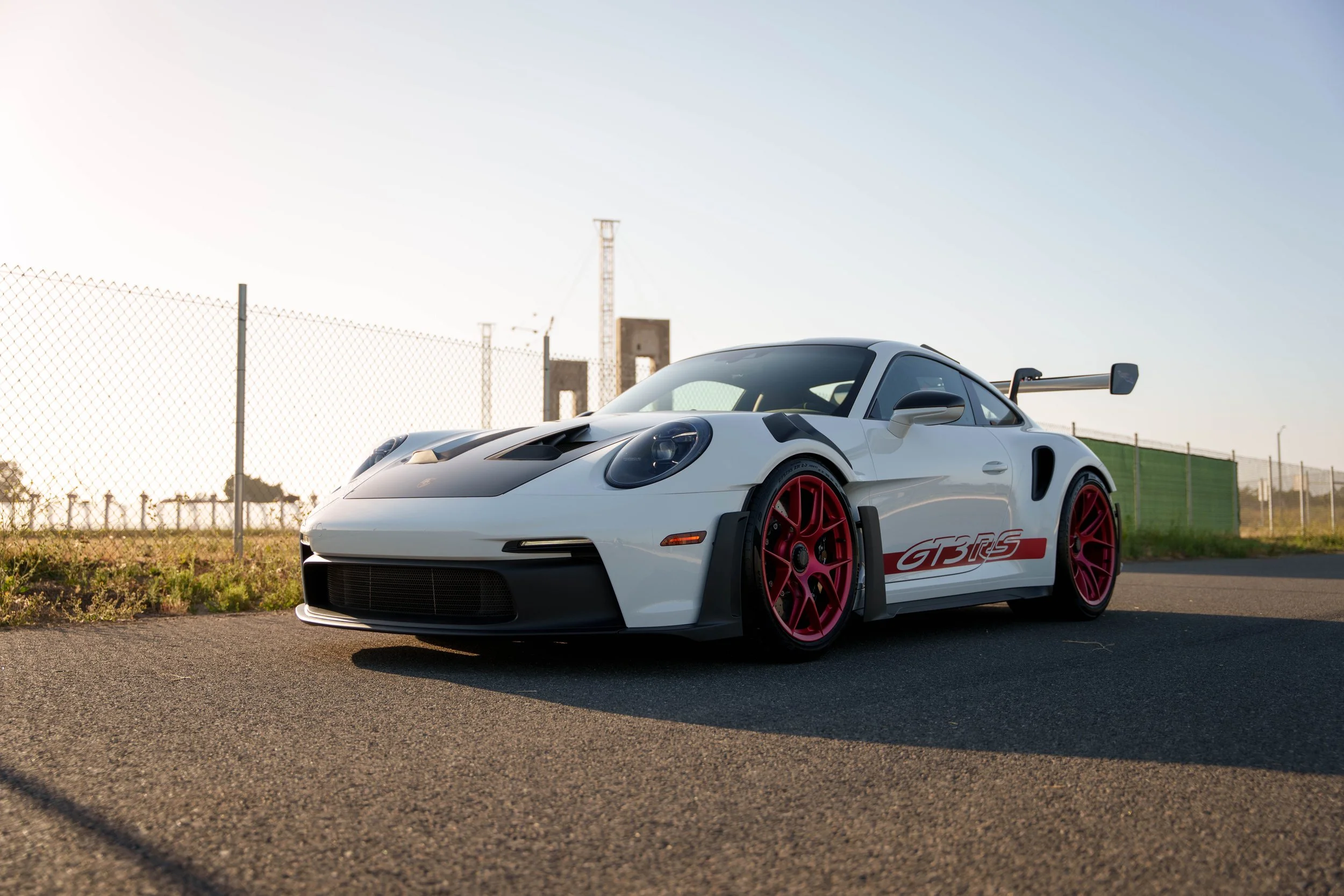 Front three-quarter view of the white Porsche 992.1 GT3 RS