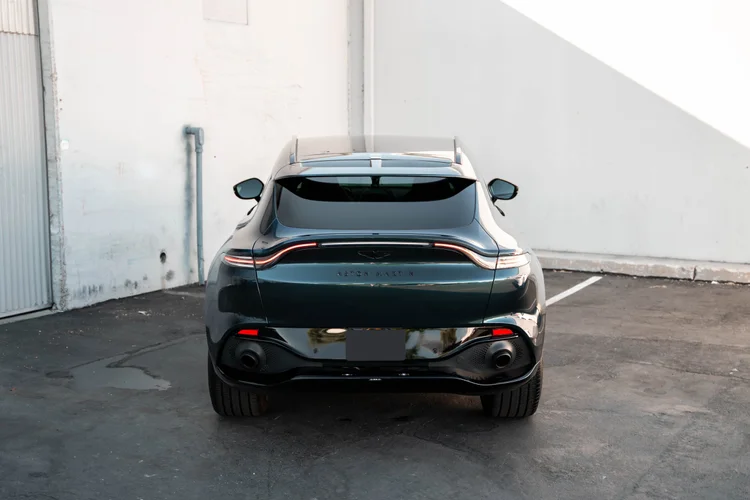 Centered rear view showing both tail lamps and twin round exhaust outlets.