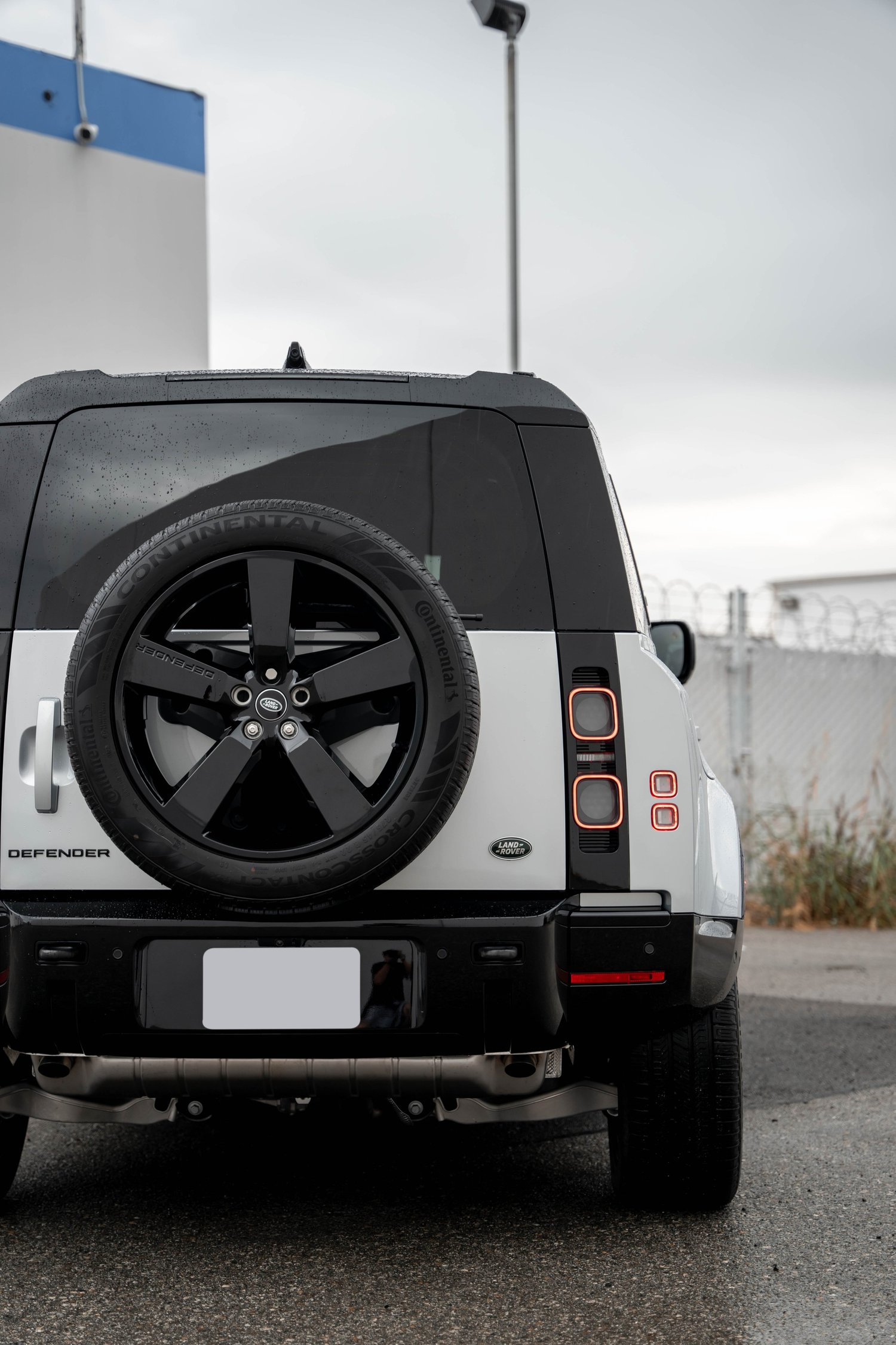 Land Rover Defender after Paint Protection Film (PPF), Window Tint and Ceramic Coating, rear body and taillight view
