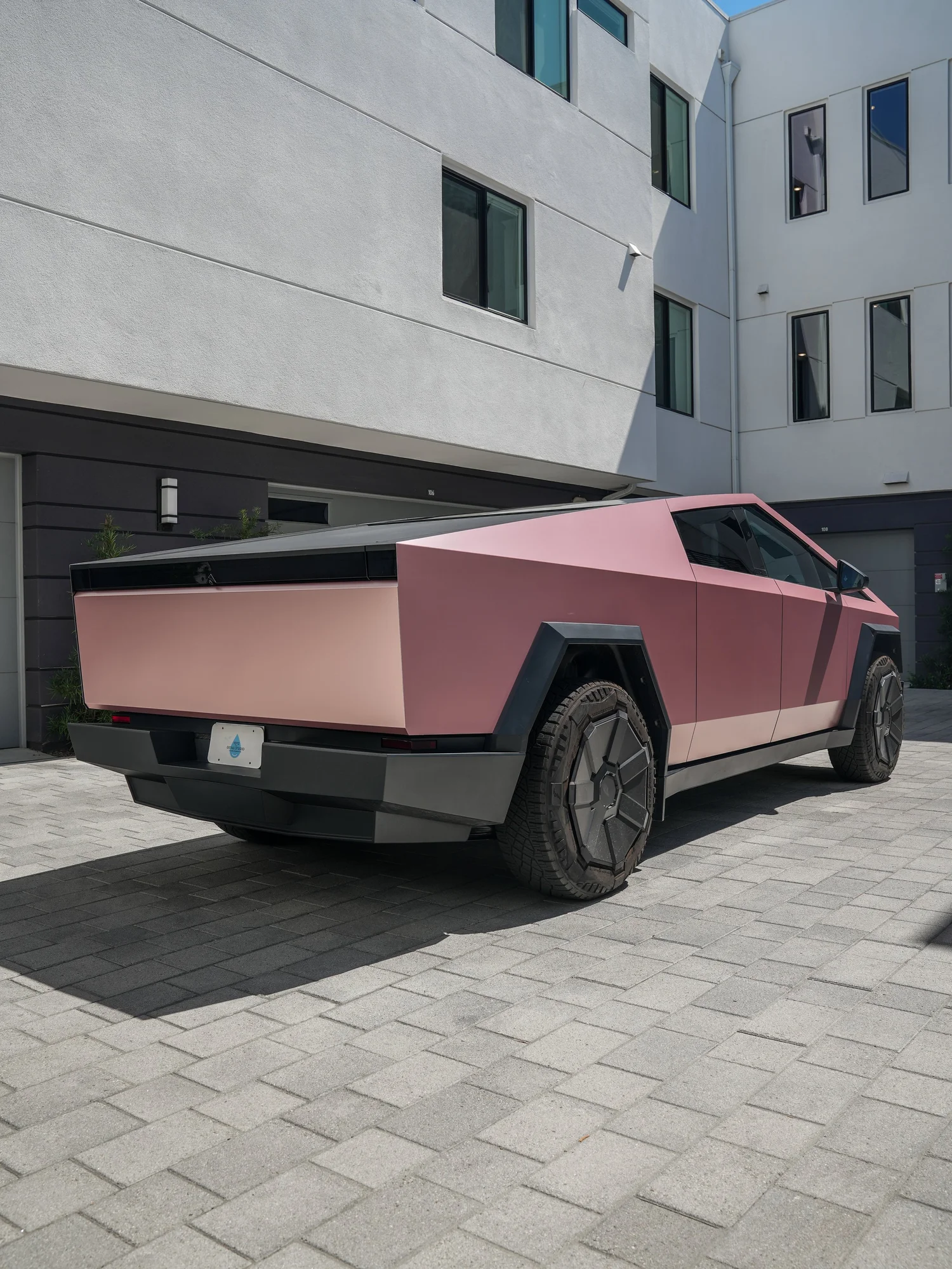 Tesla Cybertruck Matte Champagne Gold after Vinyl Wrap, rear-left three-quarter view