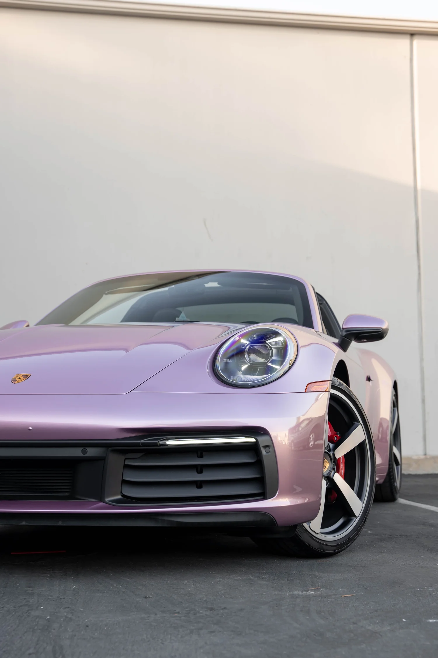 Porsche 911 Metallic Pink after Vinyl Wrap, front-corner view