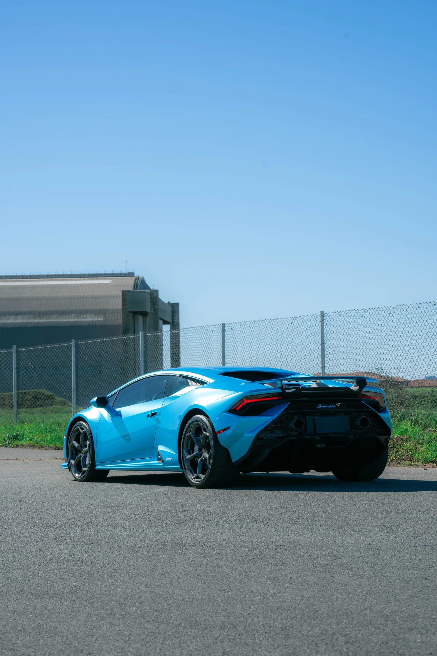 Lamborghini Huracán Tecnica after Paint Protection Film (PPF) and Vinyl Wrap, wide rear three-quarter view