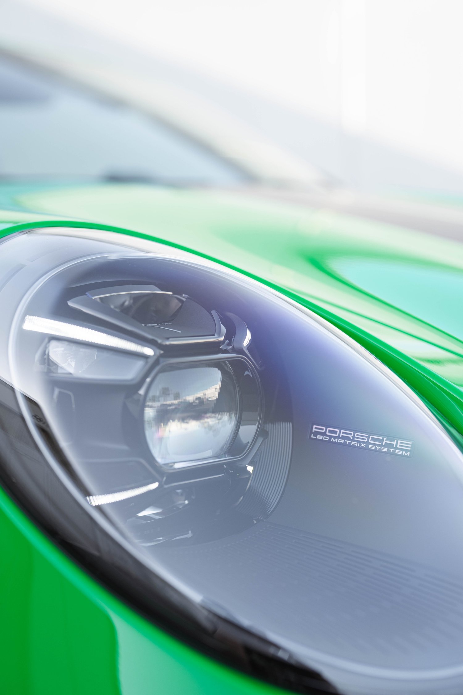 Signal Green Porsche 911 Turbo S after Paint Protection Film (PPF), Window Tint and Ceramic Coating, front-corner view