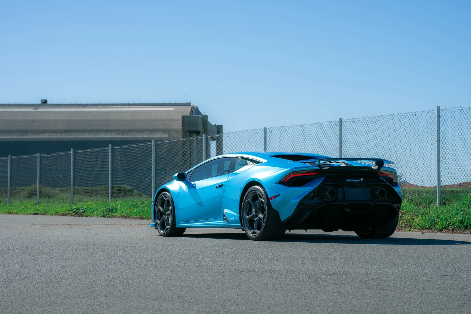 Lamborghini Huracán Tecnica after Paint Protection Film (PPF) and Vinyl Wrap, rear-left three-quarter view