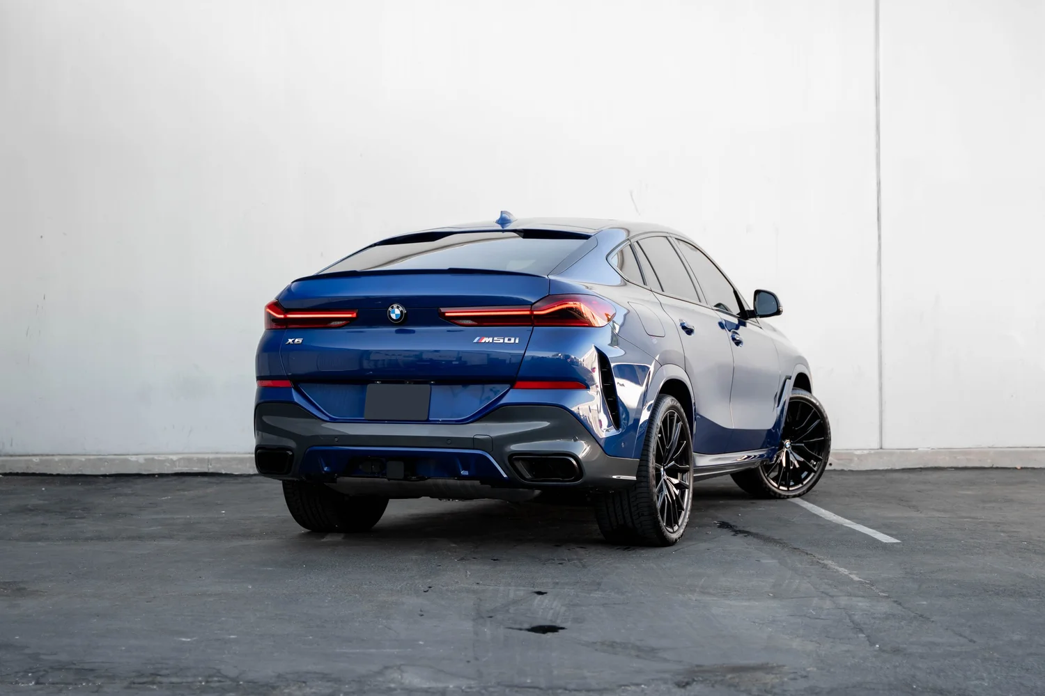 BMW X6 PPF after Paint Protection Film (PPF), rear-right three-quarter view