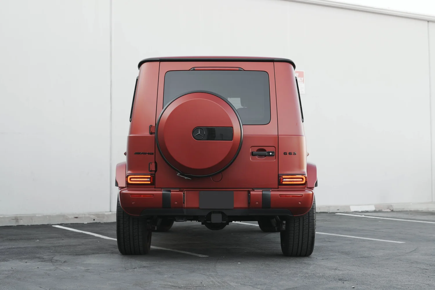 Red Mercedes-AMG G 63 after Matte PPF, Window Tint and Ceramic Coating, close rear view