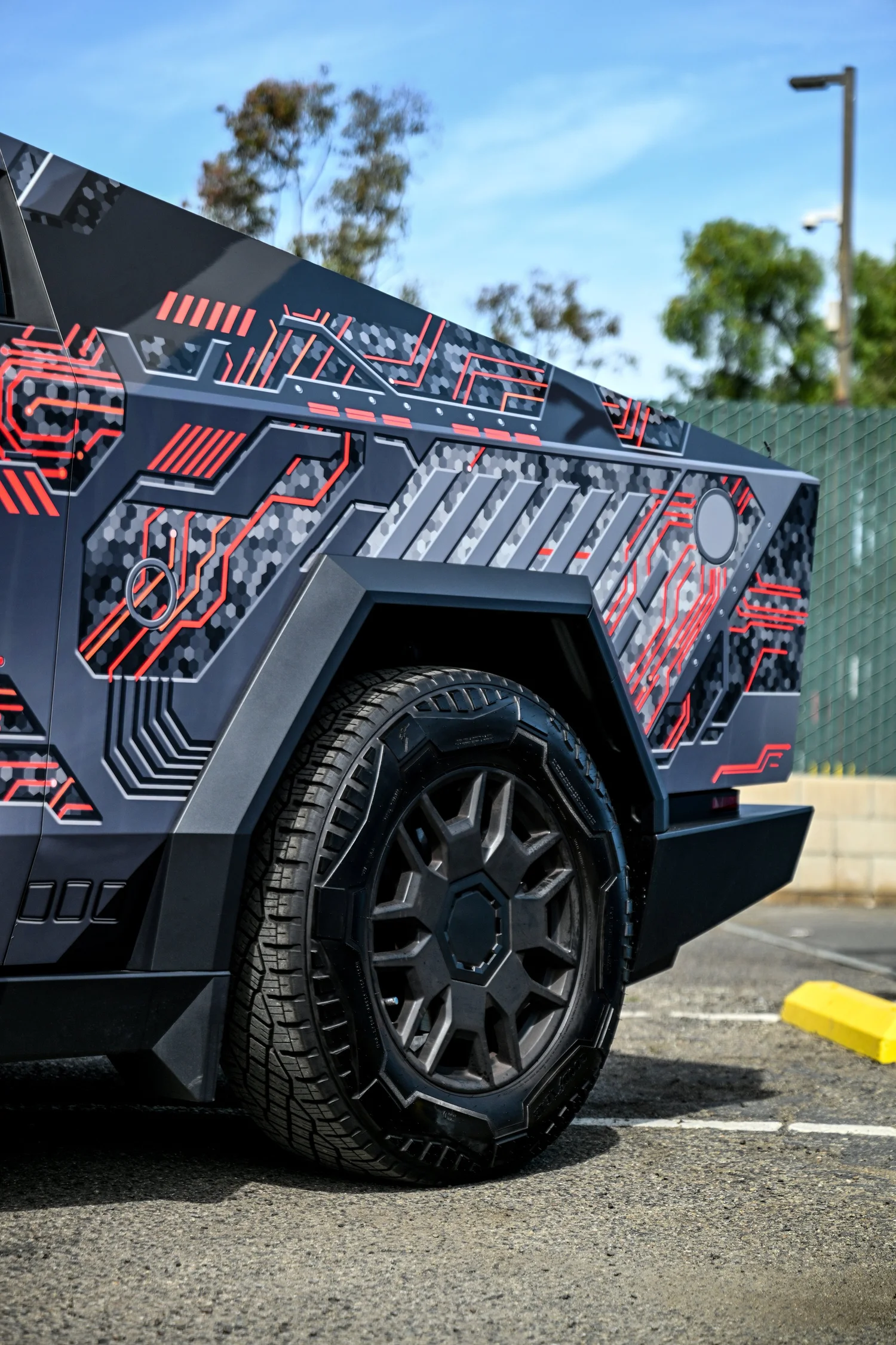 Mecha-inspired printed vinyl wrap details on Tesla Cybertruck