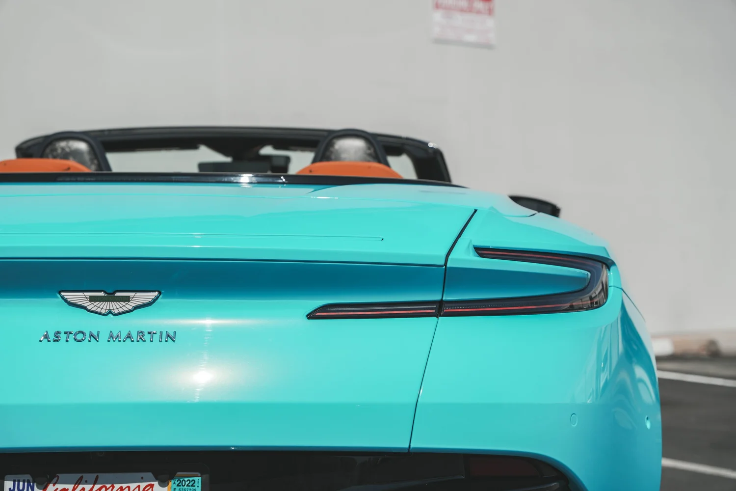 Aston Martin DB11 Miami Blue after Vinyl Wrap, hood and paint-finish detail