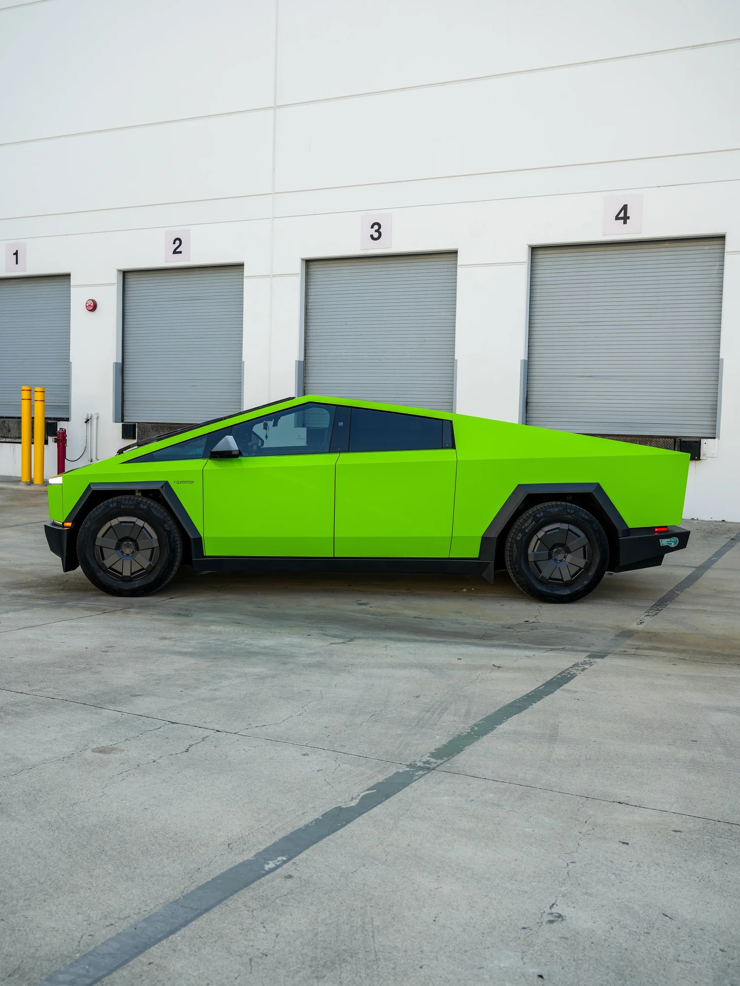 Tesla Cybertruck 3M Gloss Green after Vinyl Wrap, left-side profile