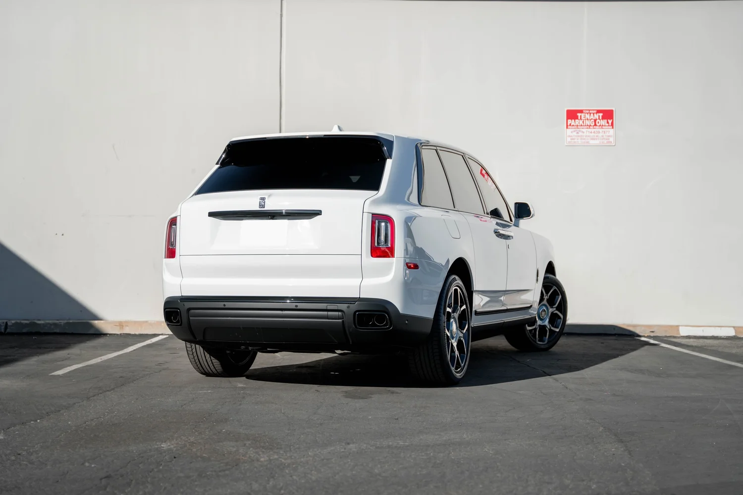 White Rolls-Royce Cullinan after Paint Protection Film (PPF), Window Tint and Ceramic Coating, rear-left three-quarter view