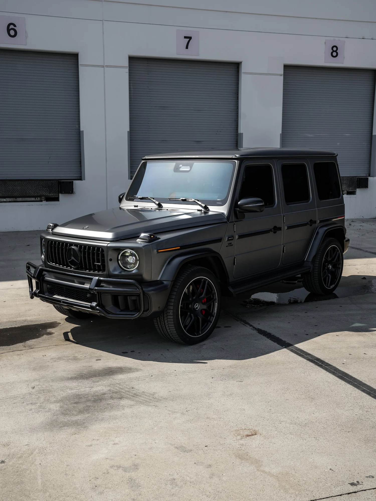 Satin Grey Mercedes-AMG G 63 after Matte PPF, Window Tint and Ceramic Coating, front-left three-quarter view