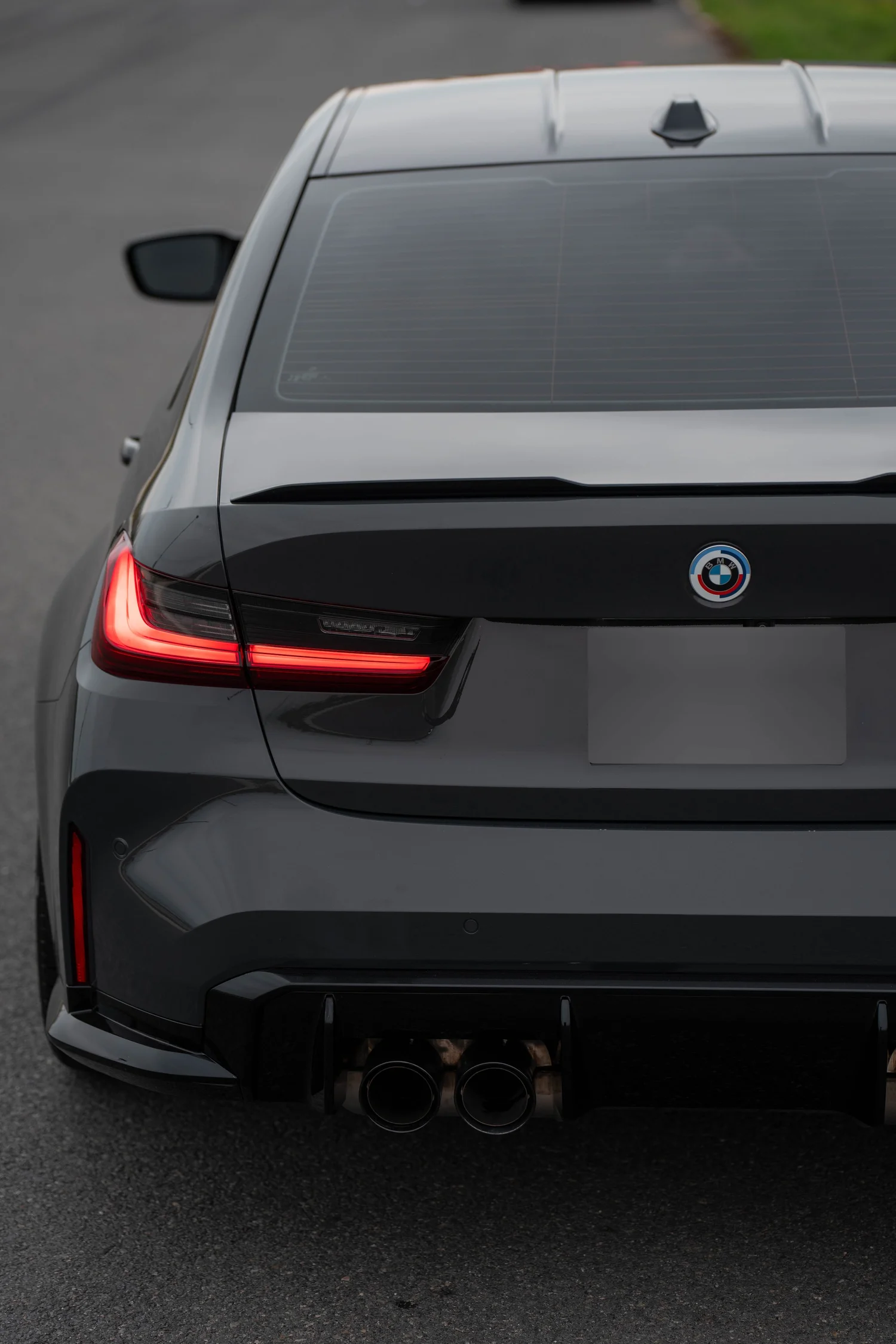 Dravit Grey BMW M3 after Paint Protection Film (PPF), Window Tint and Ceramic Coating, rear bumper and taillight detail