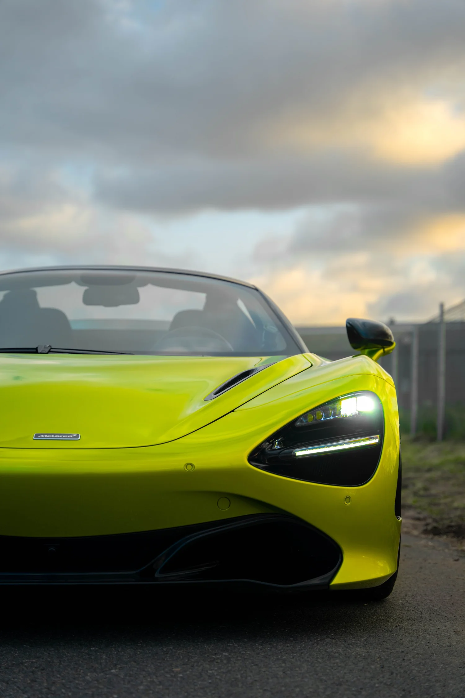Green McLaren 720S after Paint Protection Film (PPF), Window Tint and Ceramic Coating, front-corner view