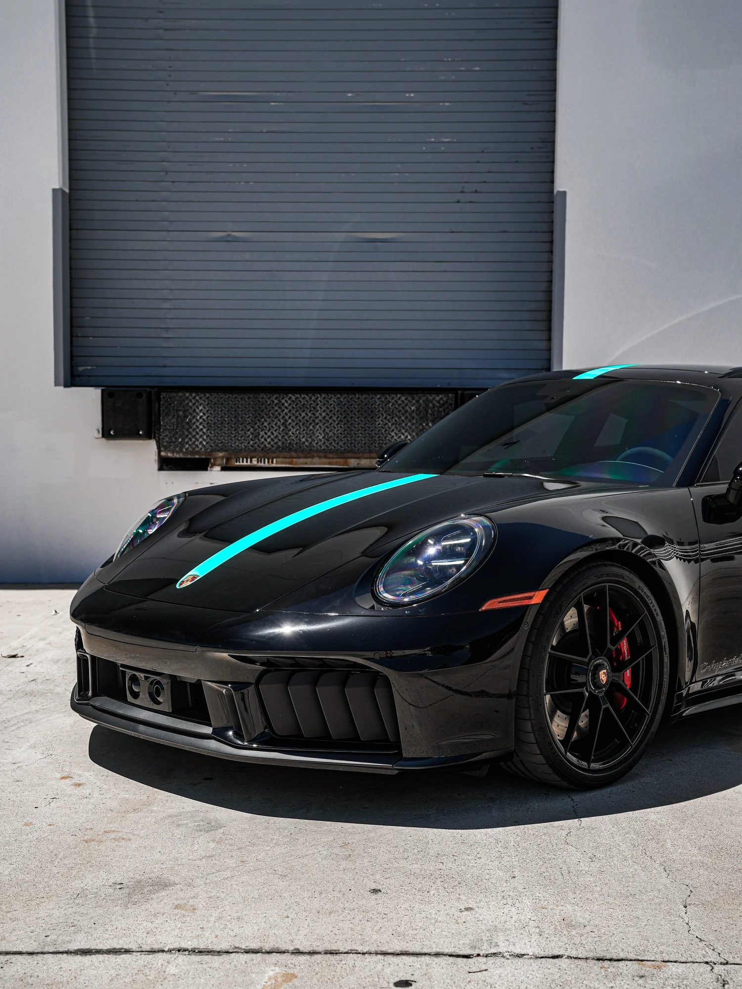 Porsche 911 Carrera 4 GTS (992.2) Custom Decals after Custom Graphics, low-angle front view