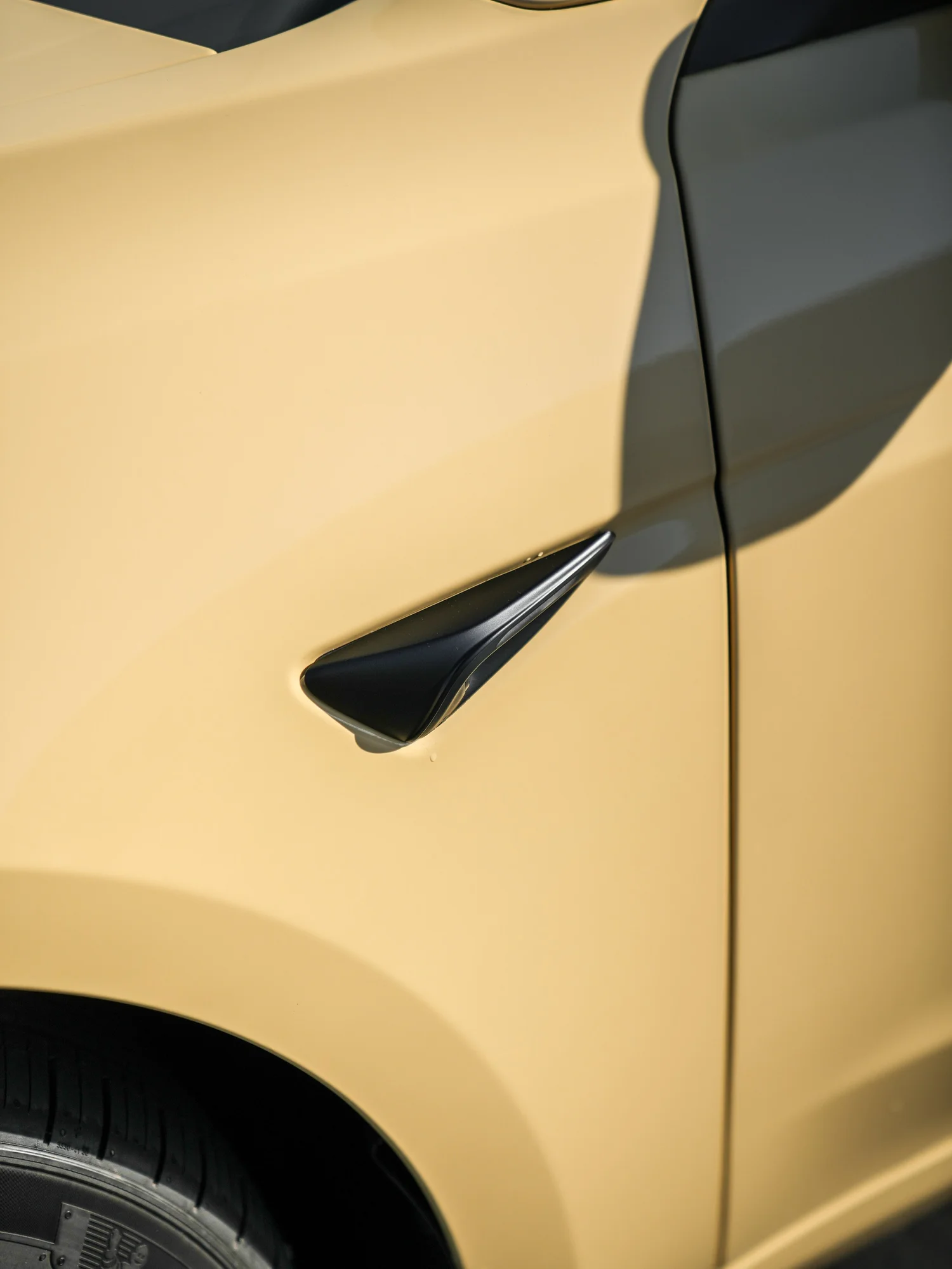 Tesla Model 3 Sunrise Yellow after Vinyl Wrap, door-jamb and trim detail