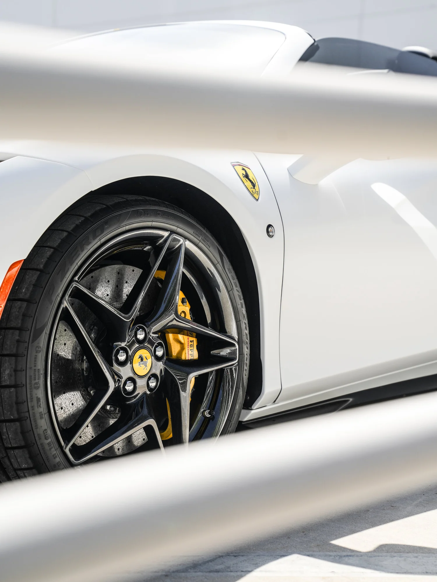 Ferrari F8 Spider after Matte PPF and Window Tint, front-fender and wheel view