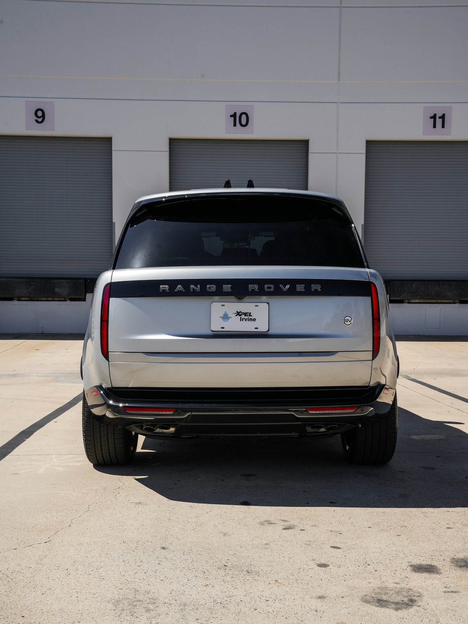 Range Rover SV centered rear view after full exterior PPF, window tint and ceramic coating