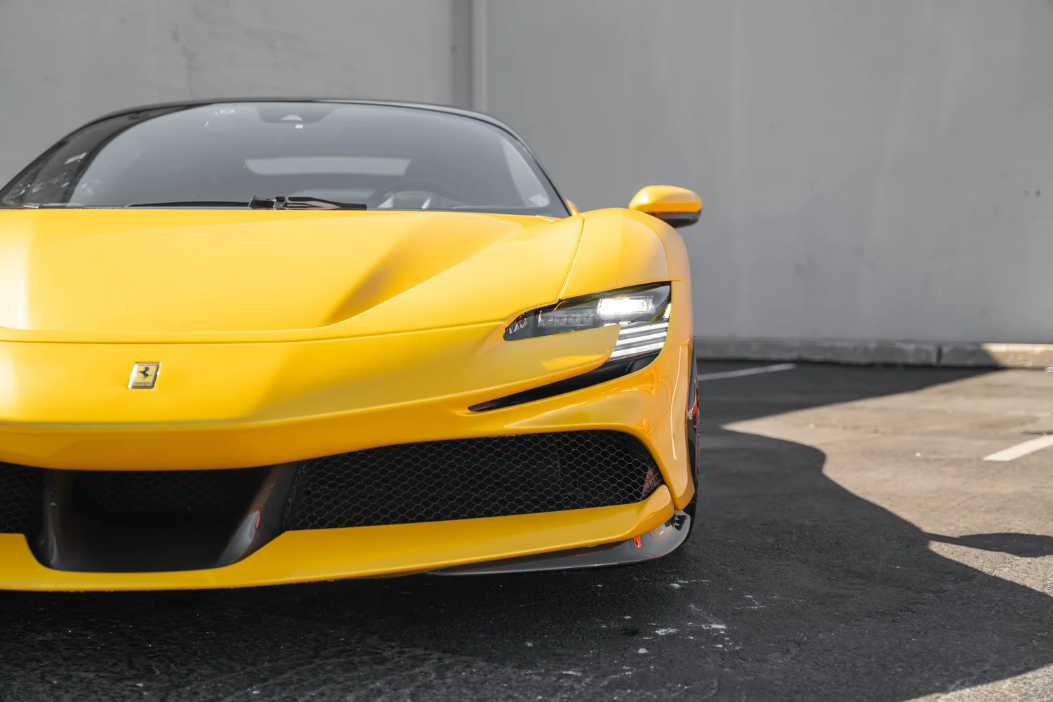 Ferrari SF90 after Paint Protection Film (PPF), Window Tint and Ceramic Coating, front-corner view