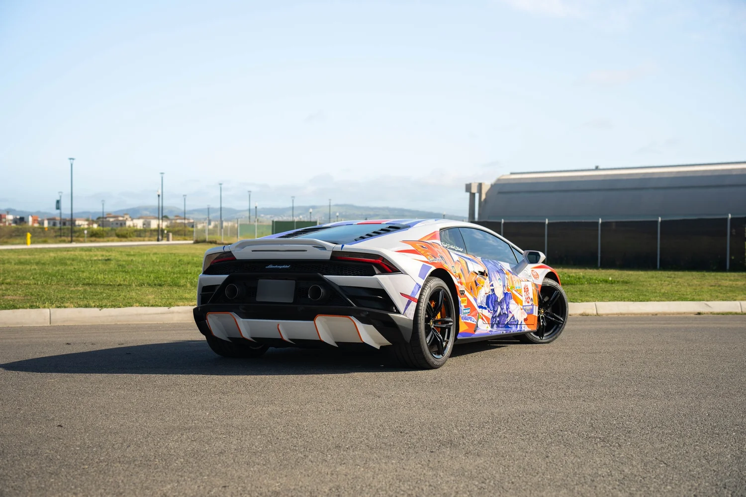 Lamborghini Huracán EVO Custom Wrap after Vinyl Wrap, rear-left three-quarter view