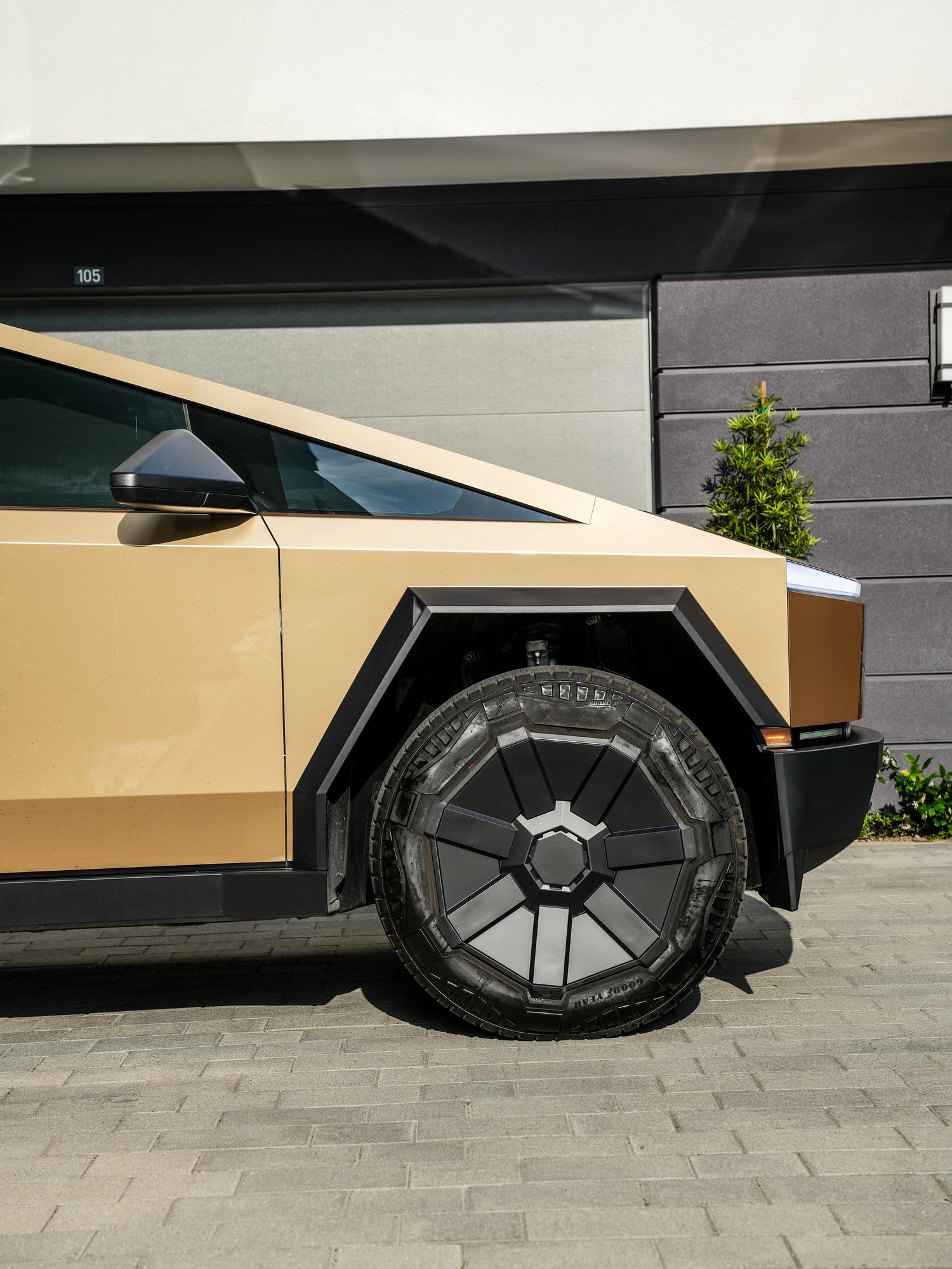 Tesla Cybertruck Milan Gold after Paint Protection Film (PPF) and Window Tint, front wheel and body view