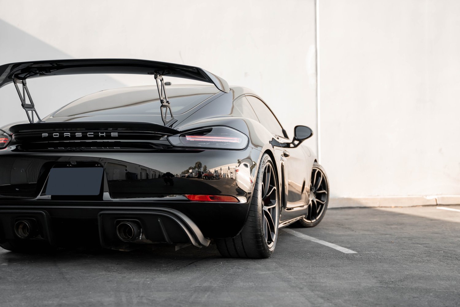 Porsche 718 Cayman GT4 after Paint Protection Film (PPF), Window Tint and Ceramic Coating, rear-quarter and wheel view